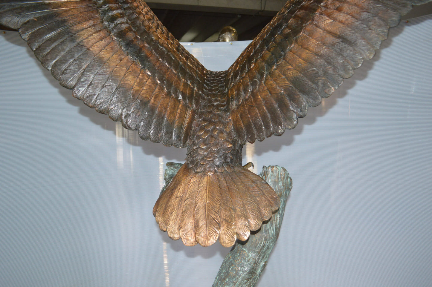 Landing Eagle on a Tree Giant Bronze Statue - Size: 72"L x 36"W x 88"H.