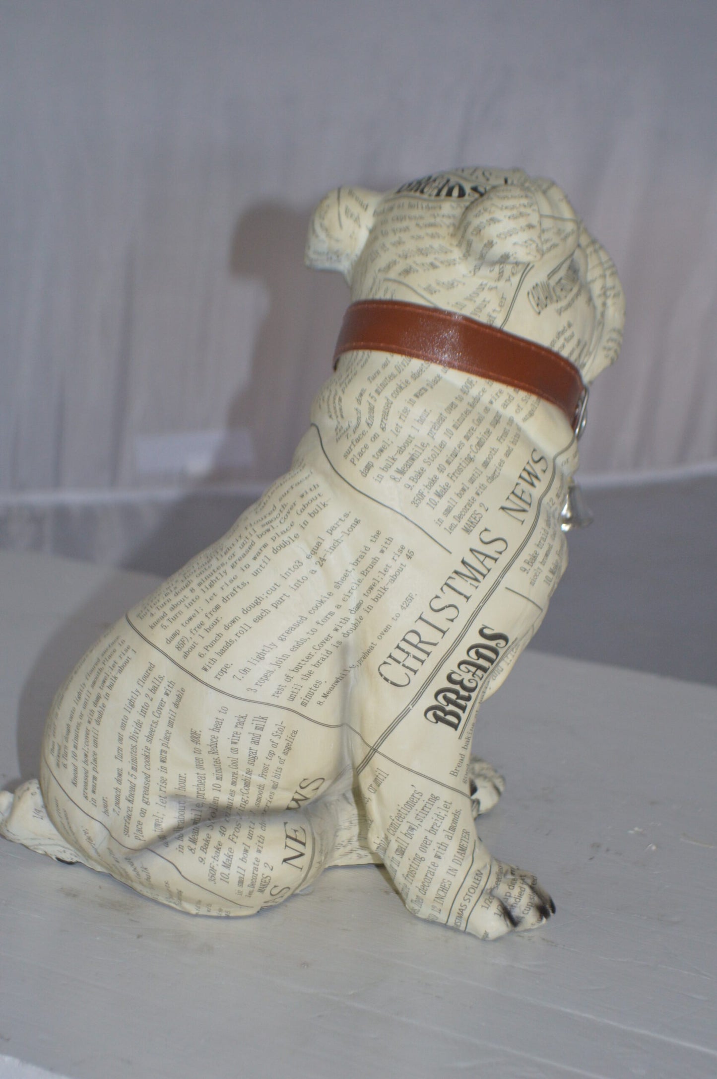 Modern News Bulldog made of Resin - Size: 9"L x 8"W x 12"H.