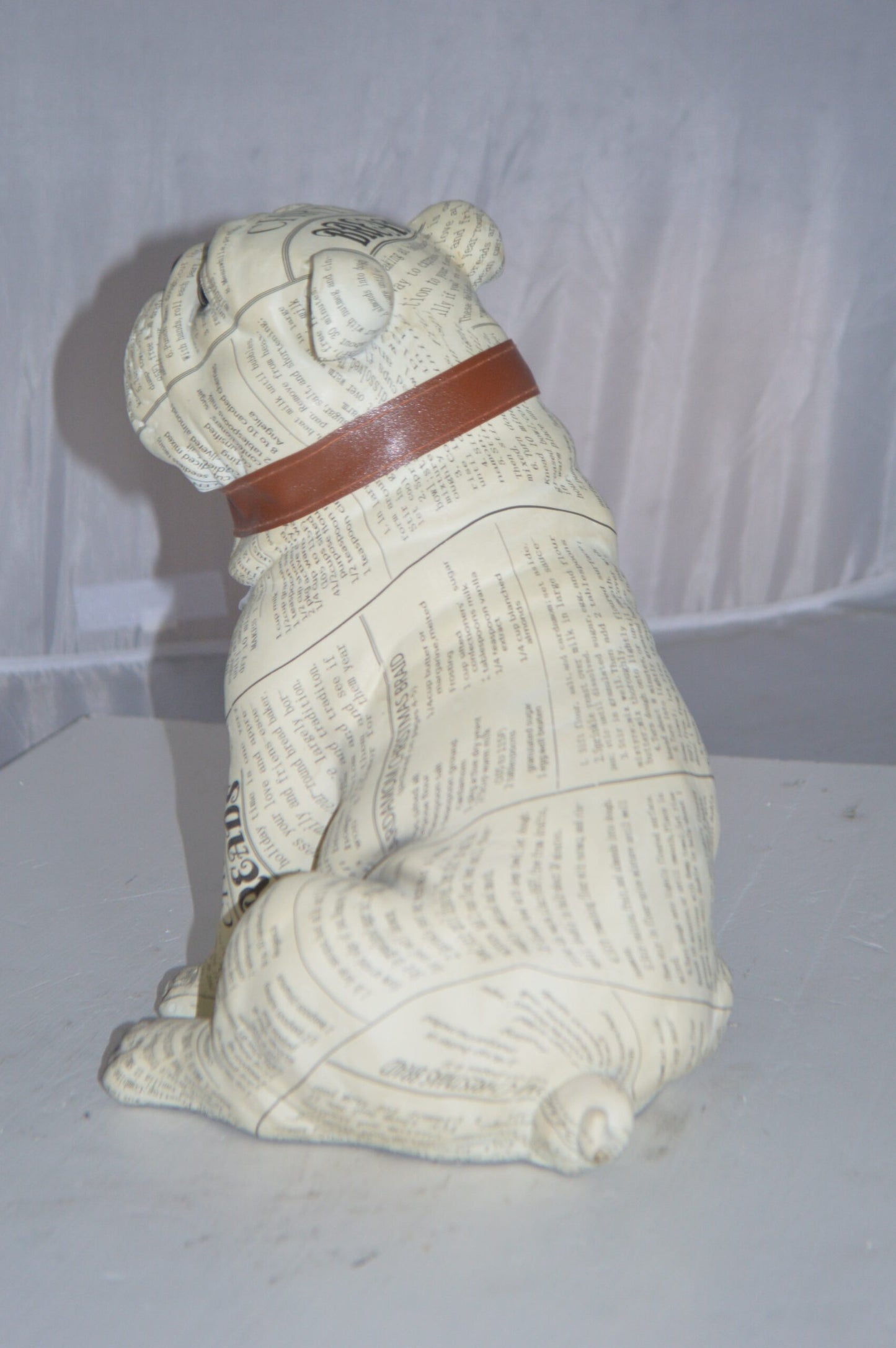 Modern News Bulldog made of Resin - Size: 9"L x 8"W x 12"H.