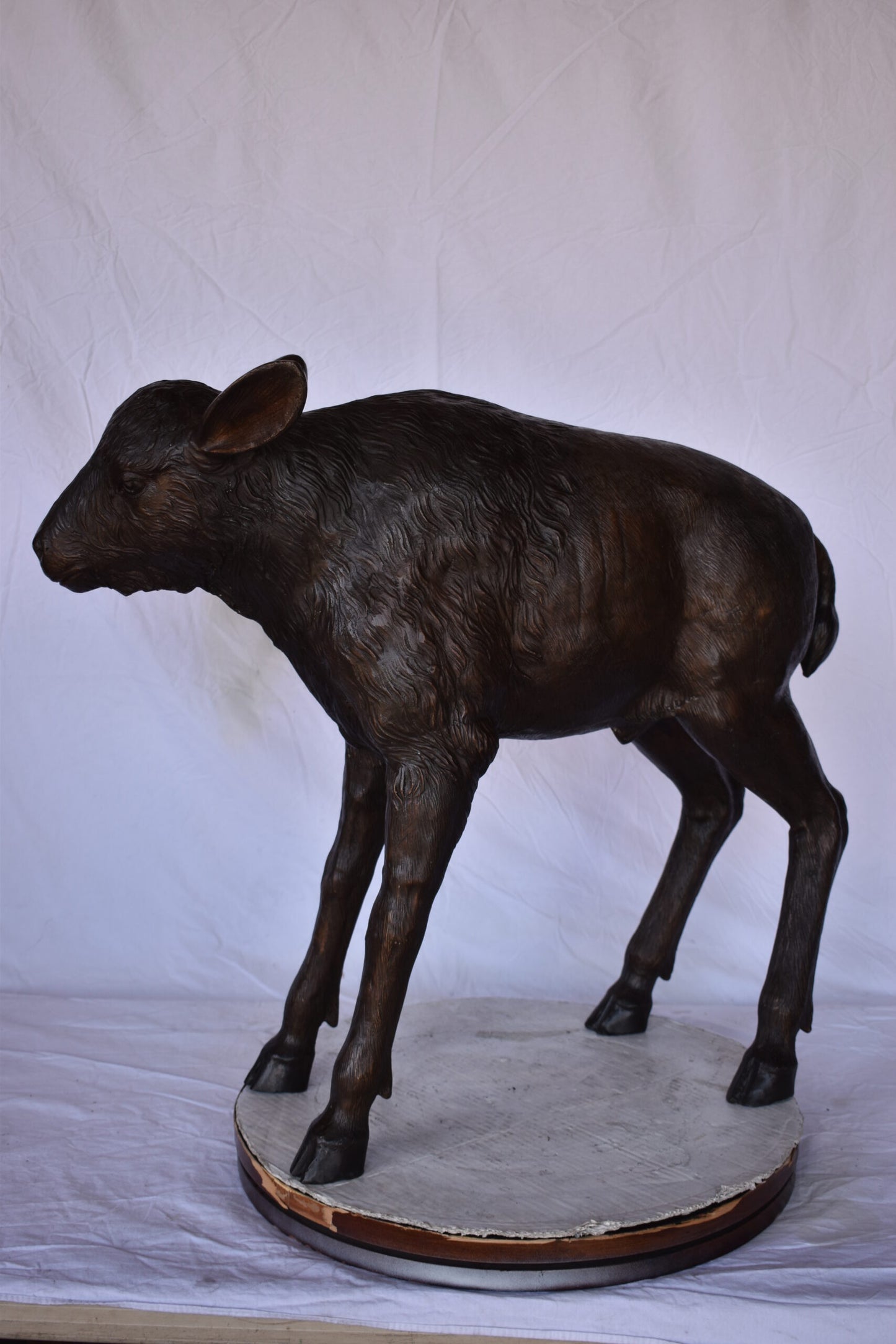 Bison Calf Lifesize Bronze Statue - Size: 37"L x 15"W x 32"H.