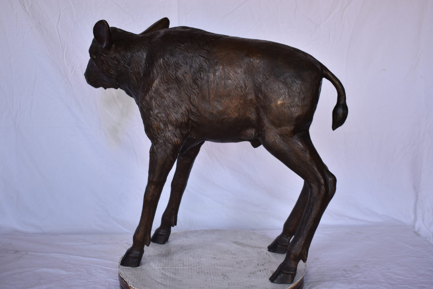 Bison Calf Lifesize Bronze Statue - Size: 37"L x 15"W x 32"H.