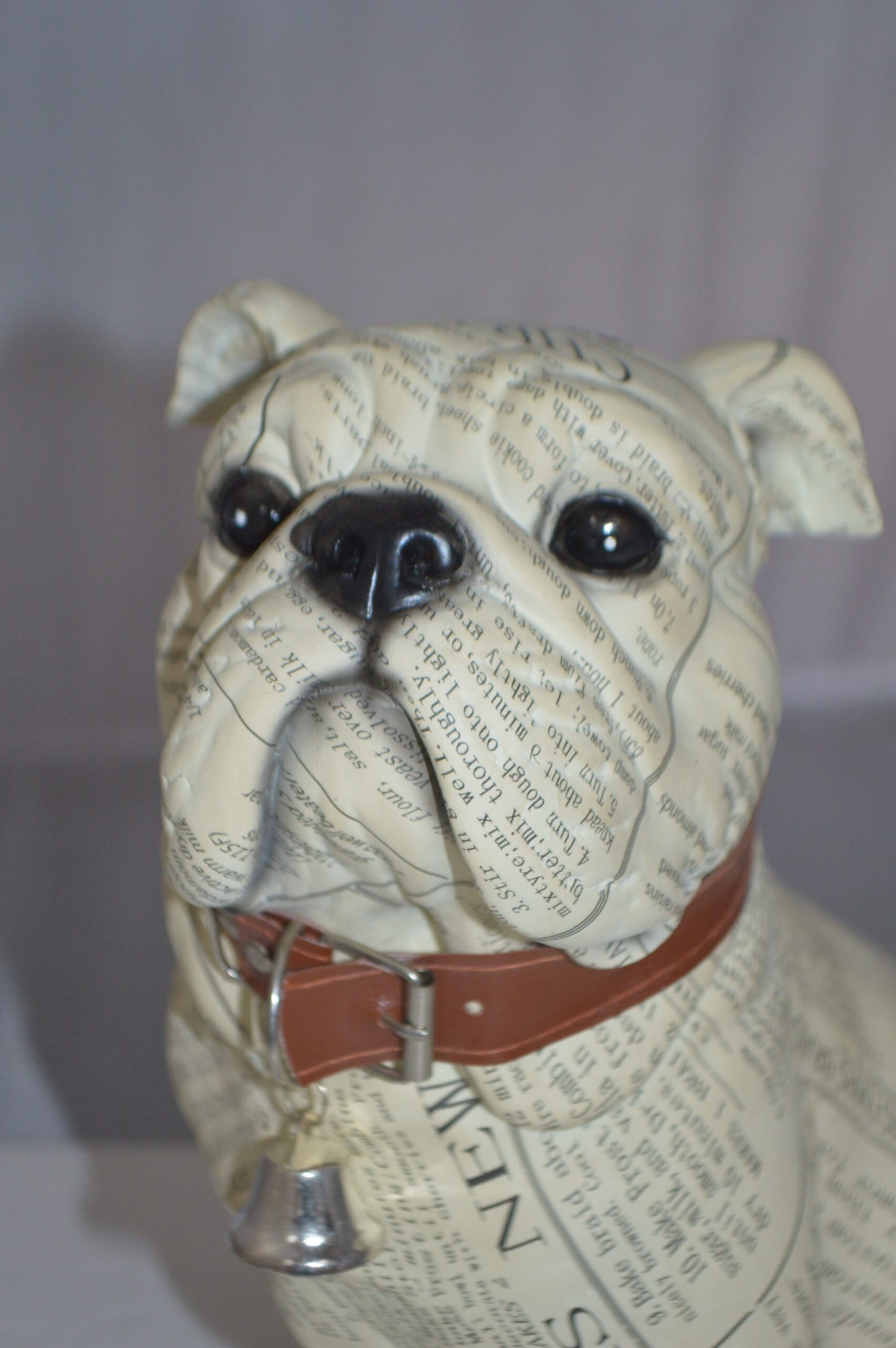 Modern News Bulldog made of Resin - Size: 9"L x 8"W x 12"H.