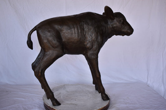 Bison Calf Lifesize Bronze Statue - Size: 37"L x 15"W x 32"H.