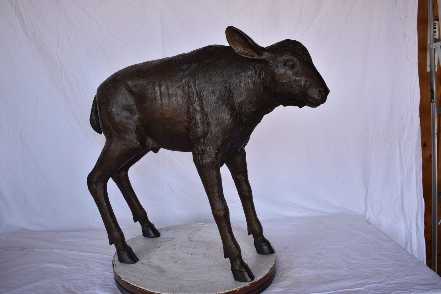 Bison Calf Lifesize Bronze Statue - Size: 37"L x 15"W x 32"H.