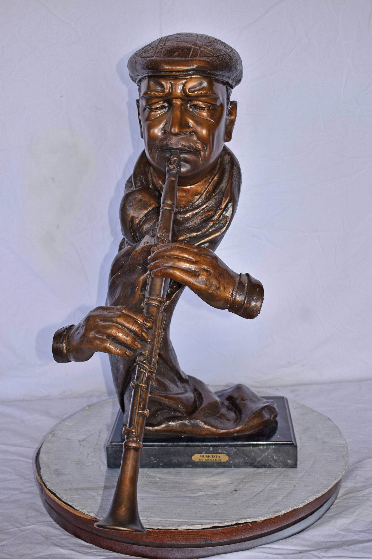 Musicista By Arnadia, Bust of Clarinet Player Bronze Statue - 17" x 25" x 31"H.
