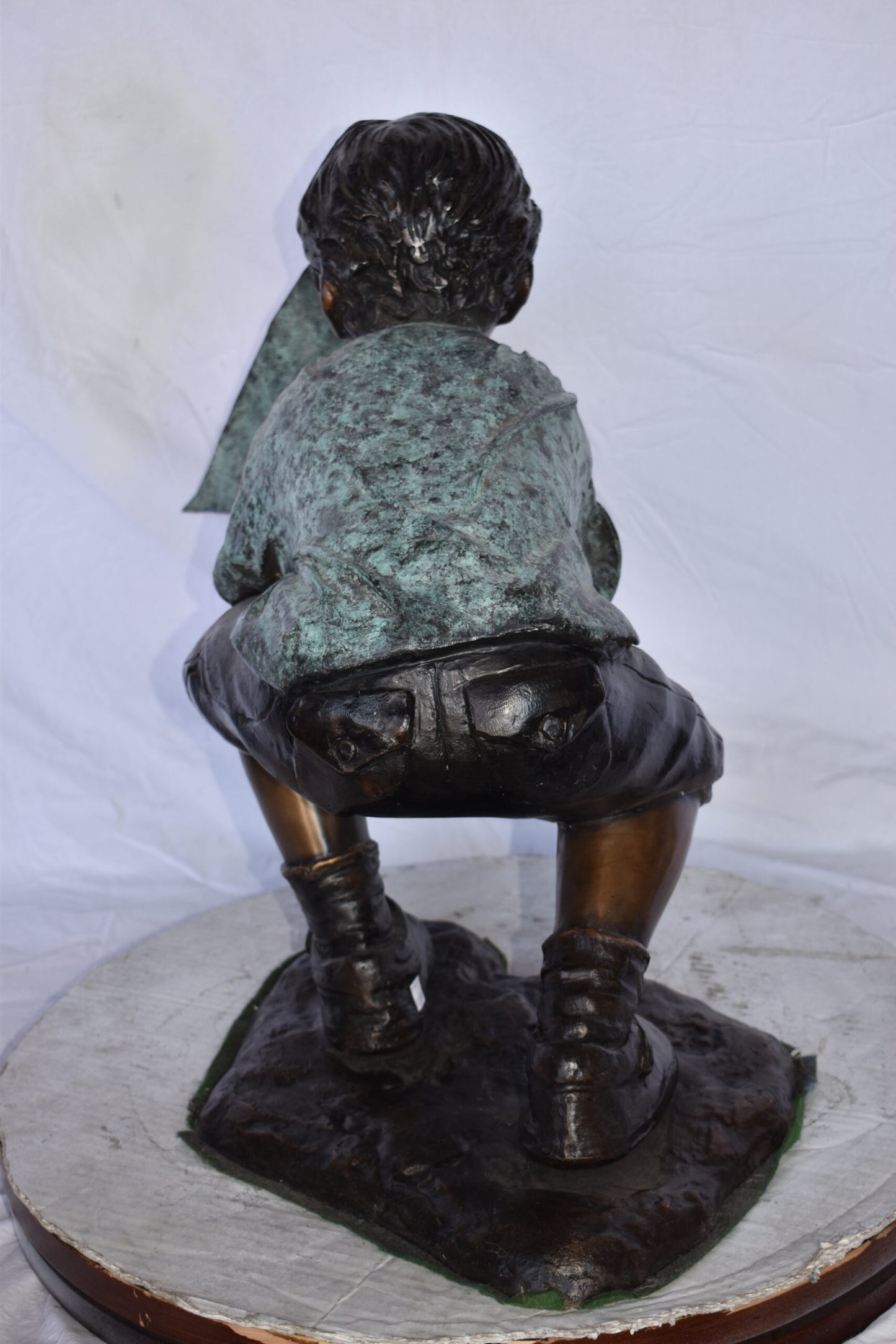 Boy Sends His Toy Boat on The Water Bronze Statue - Size: 16"L x 33"W x 24"H.