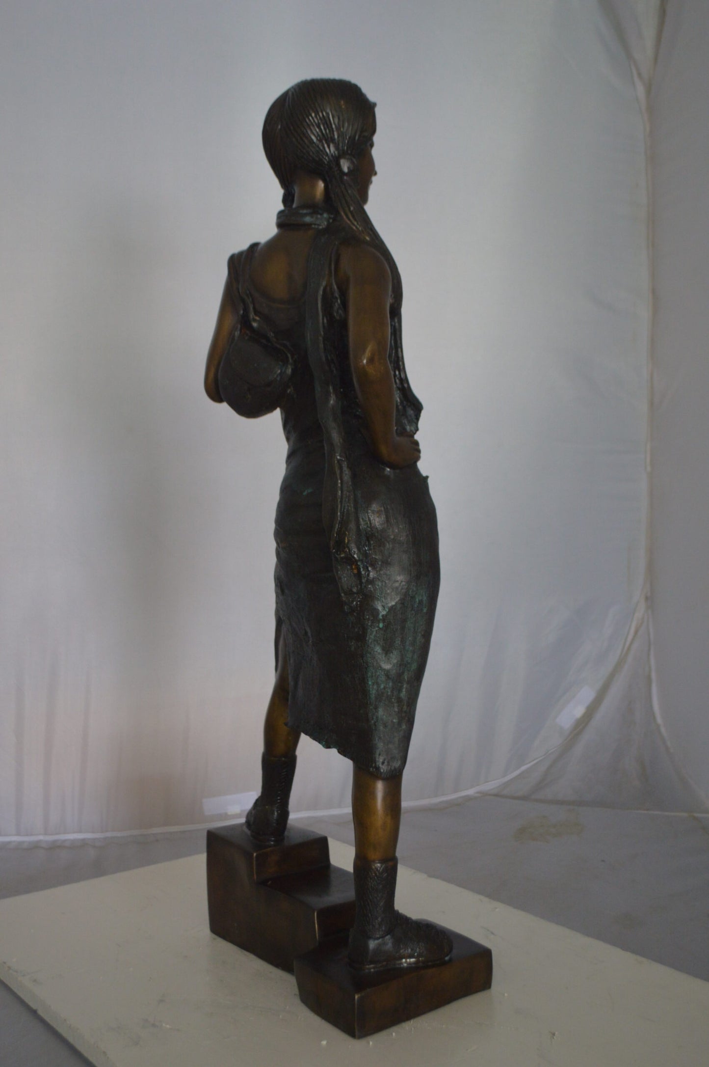 Girl Posing on Steps Bronze Statue - Size: 7"L x 12"W x 33"H.