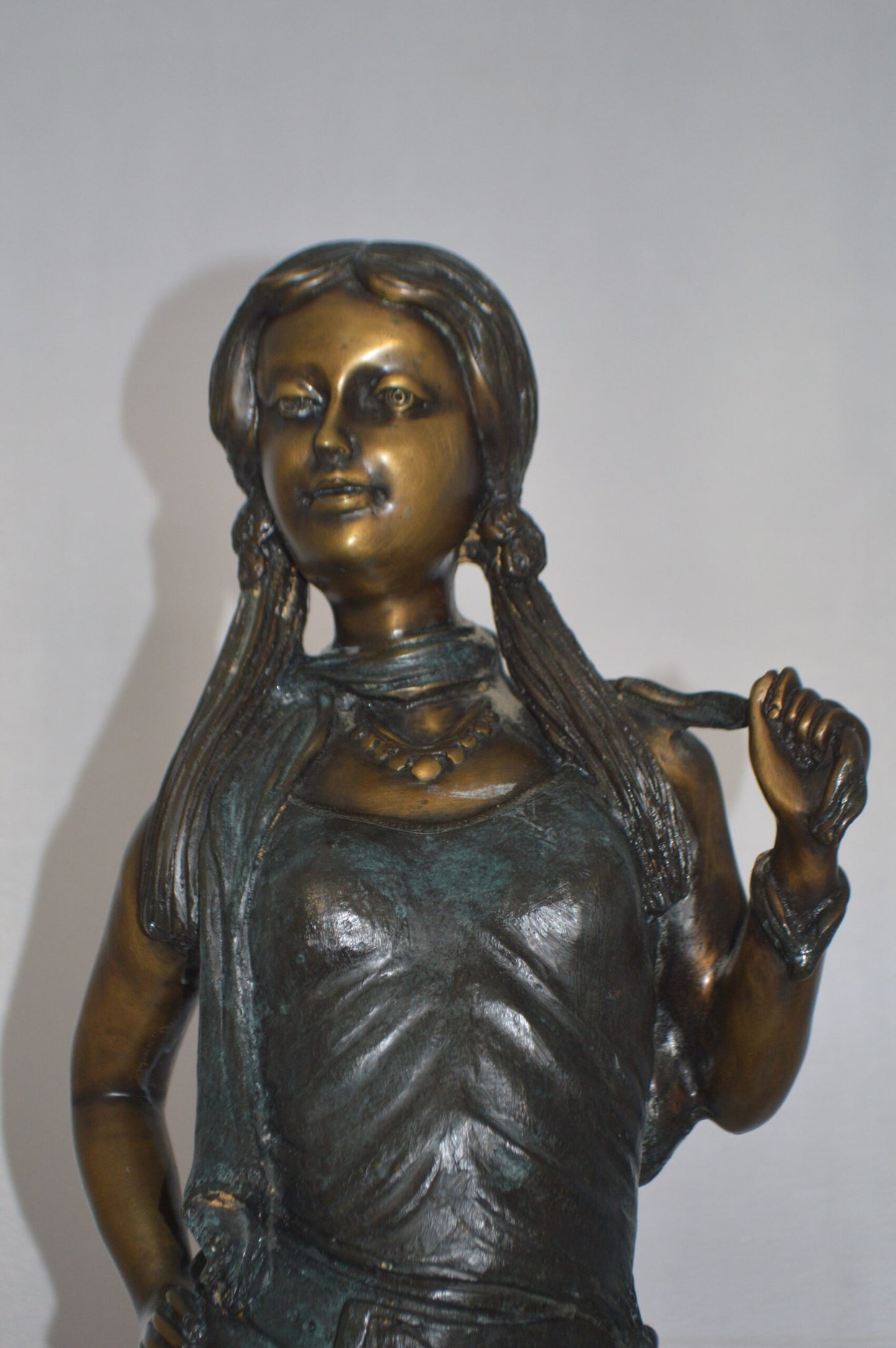 Girl Posing on Steps Bronze Statue - Size: 7"L x 12"W x 33"H.