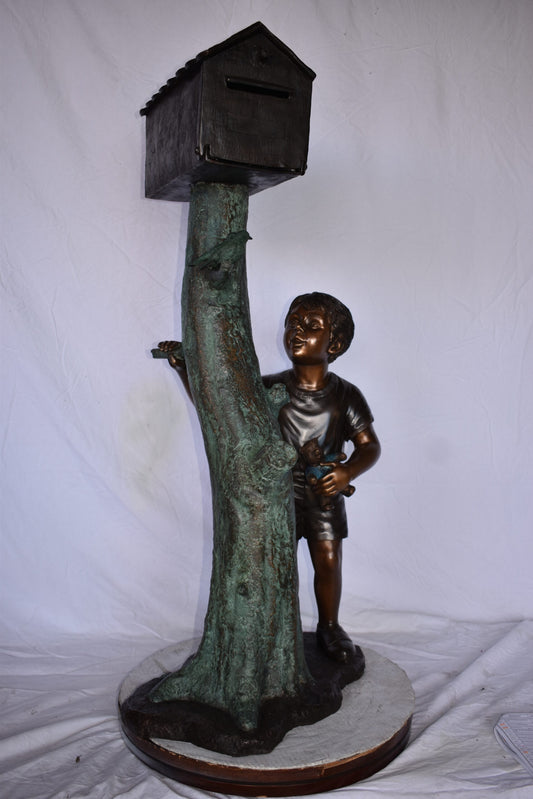 A Boy Standing by His Mailbox Looking at Birds Bronze Statue 25" x 22" x 51"H.