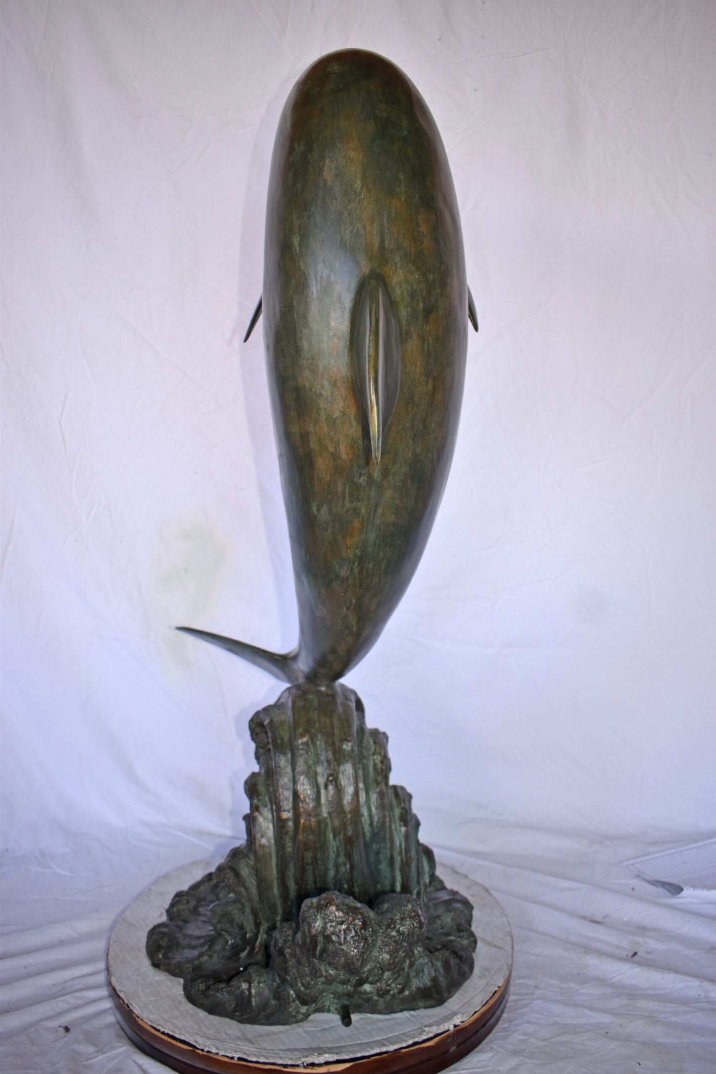 Fountain of A Dolphin Jumping of The Water Made of Bronze Size: 21"x 30" x 50"H.