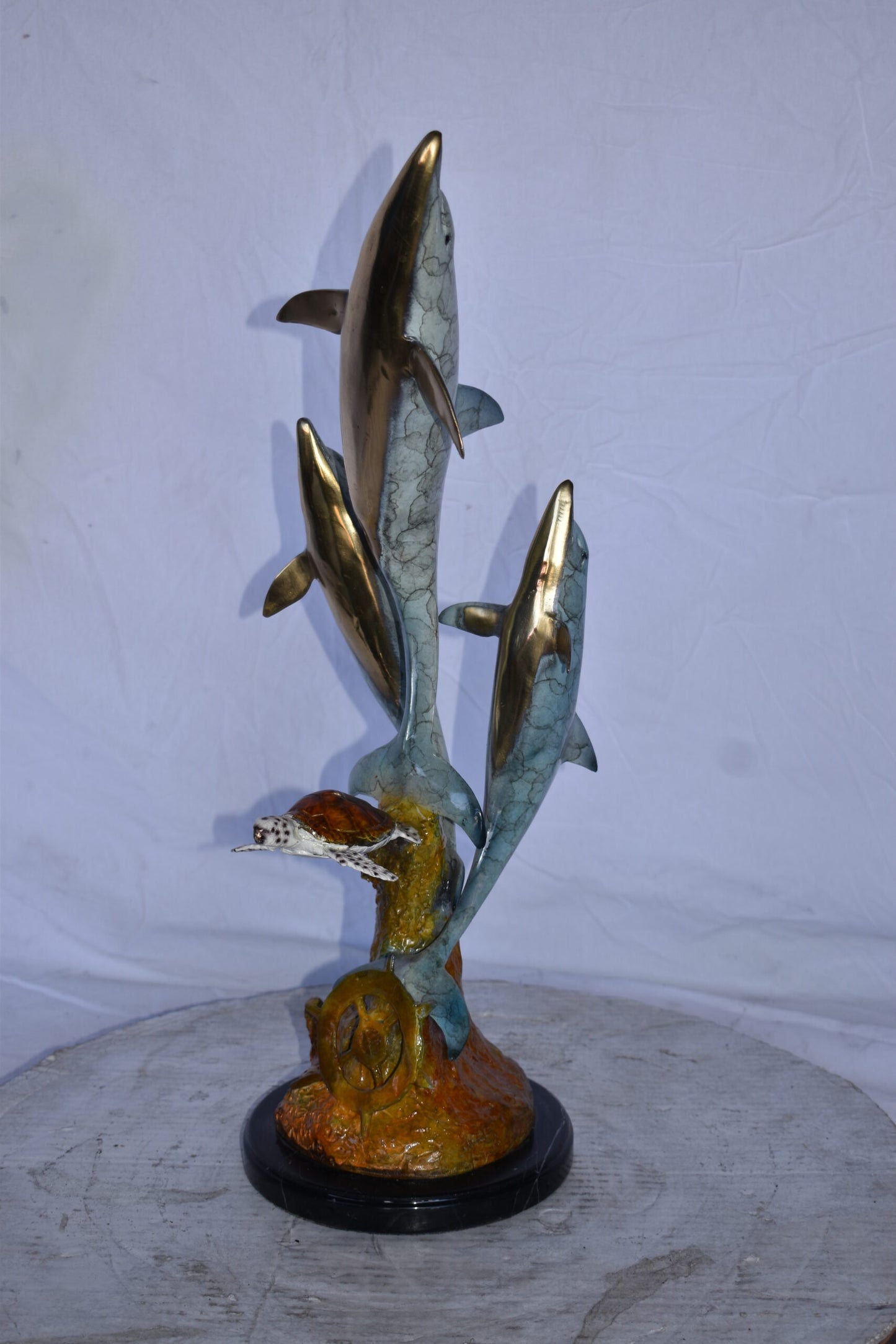 Three Dolphins Jumping Next to A Sea Turtle Bronze Statue 10"x 11" x 24"H.