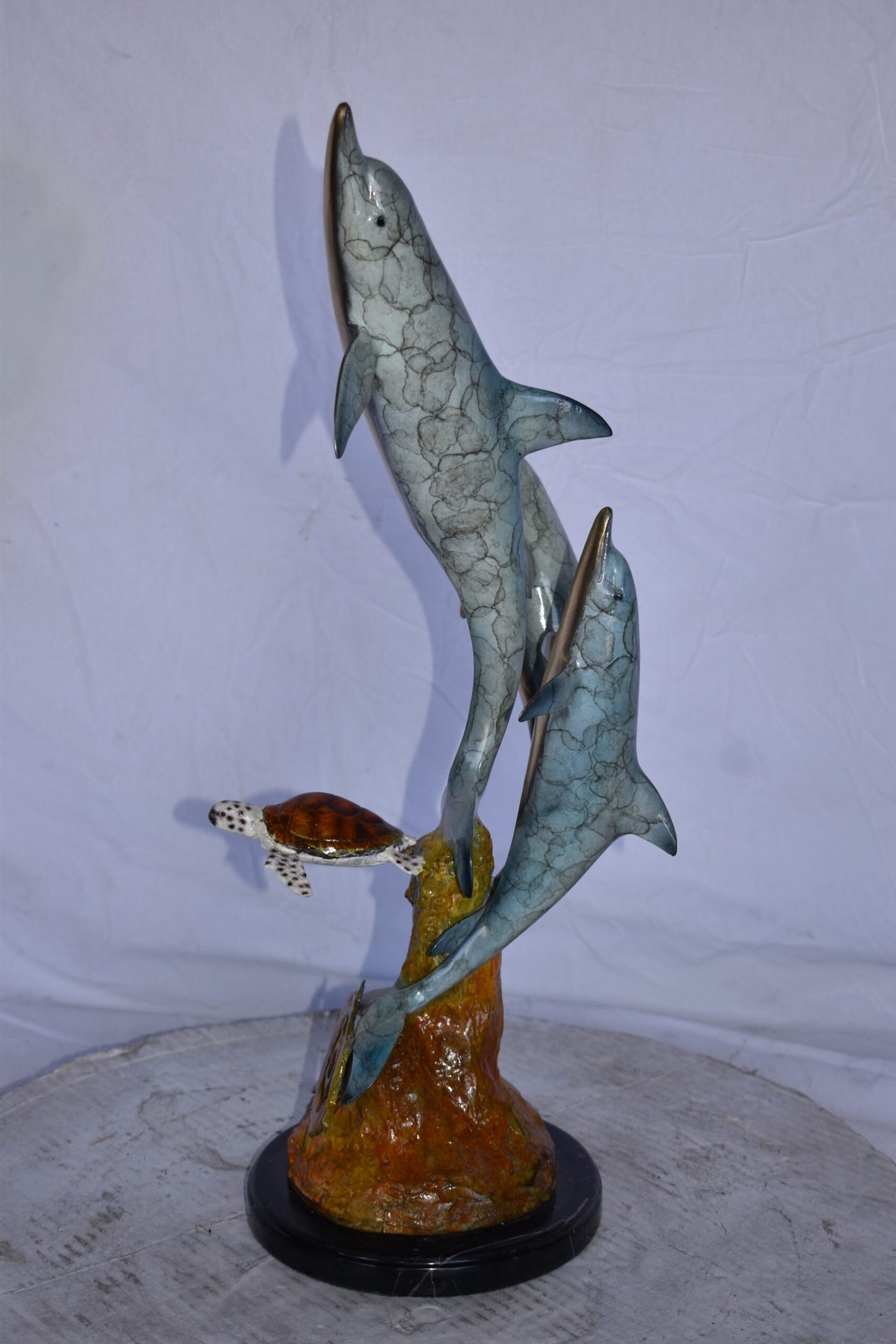 Three Dolphins Jumping Next to A Sea Turtle Bronze Statue 10"x 11" x 24"H.