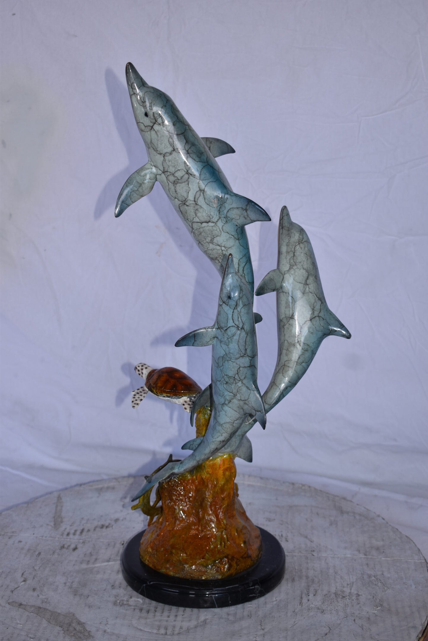Three Dolphins Jumping Next to A Sea Turtle Bronze Statue 10"x 11" x 24"H.