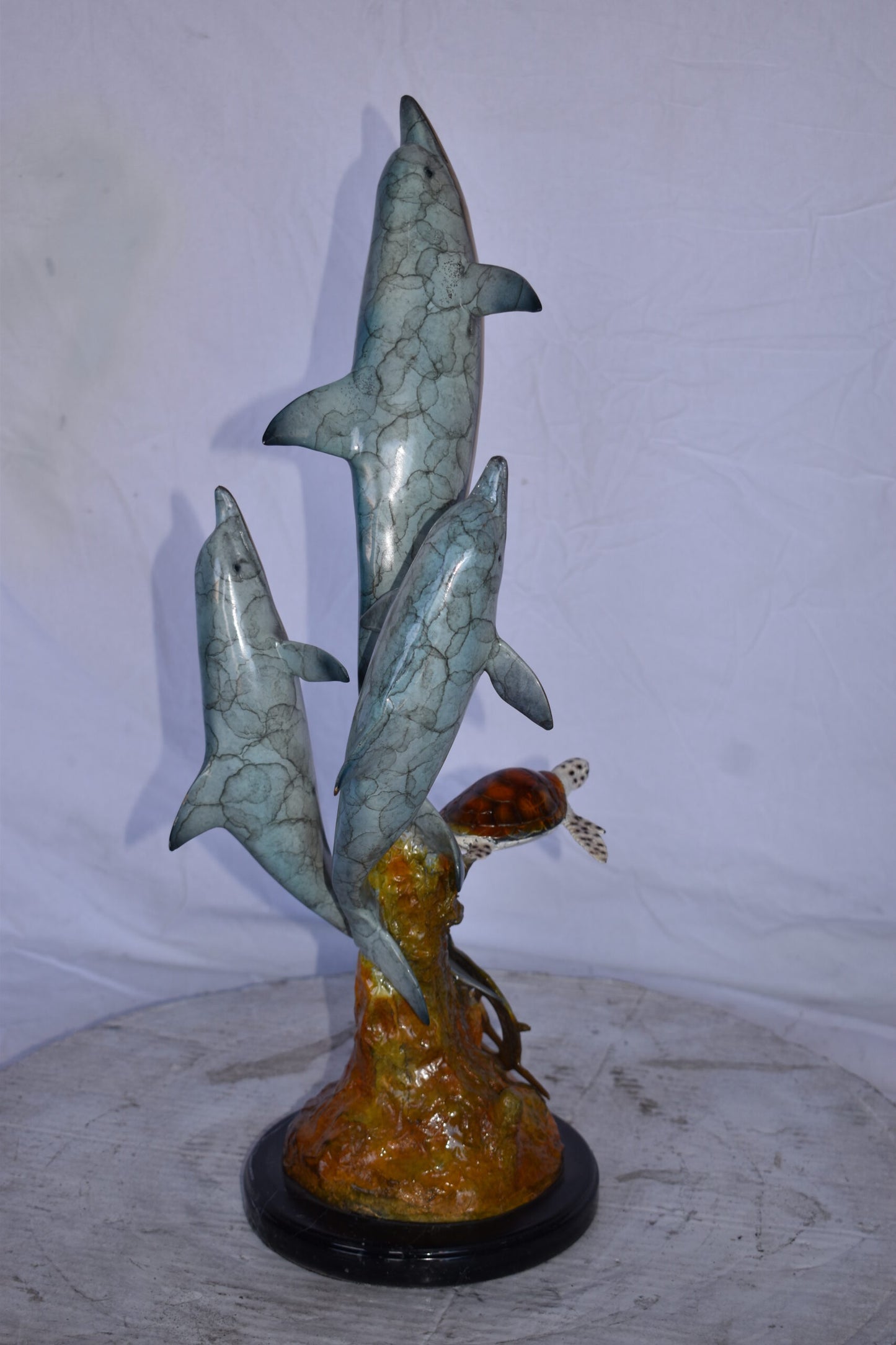 Three Dolphins Jumping Next to A Sea Turtle Bronze Statue 10"x 11" x 24"H.