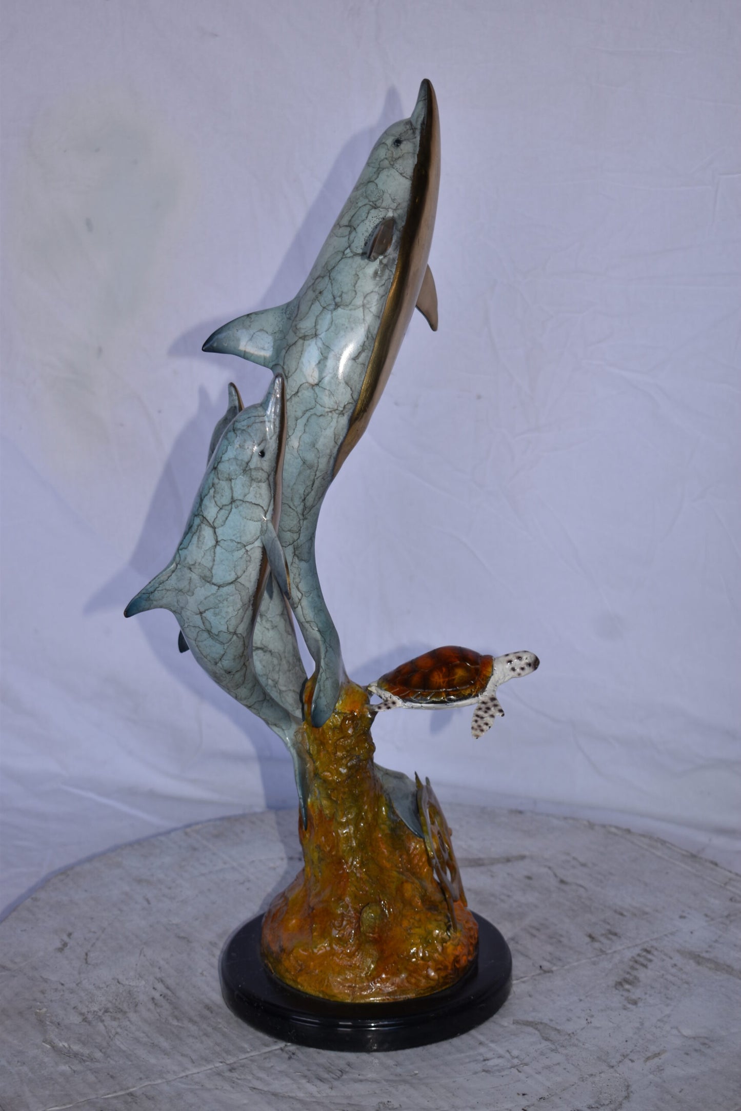Three Dolphins Jumping Next to A Sea Turtle Bronze Statue 10"x 11" x 24"H.