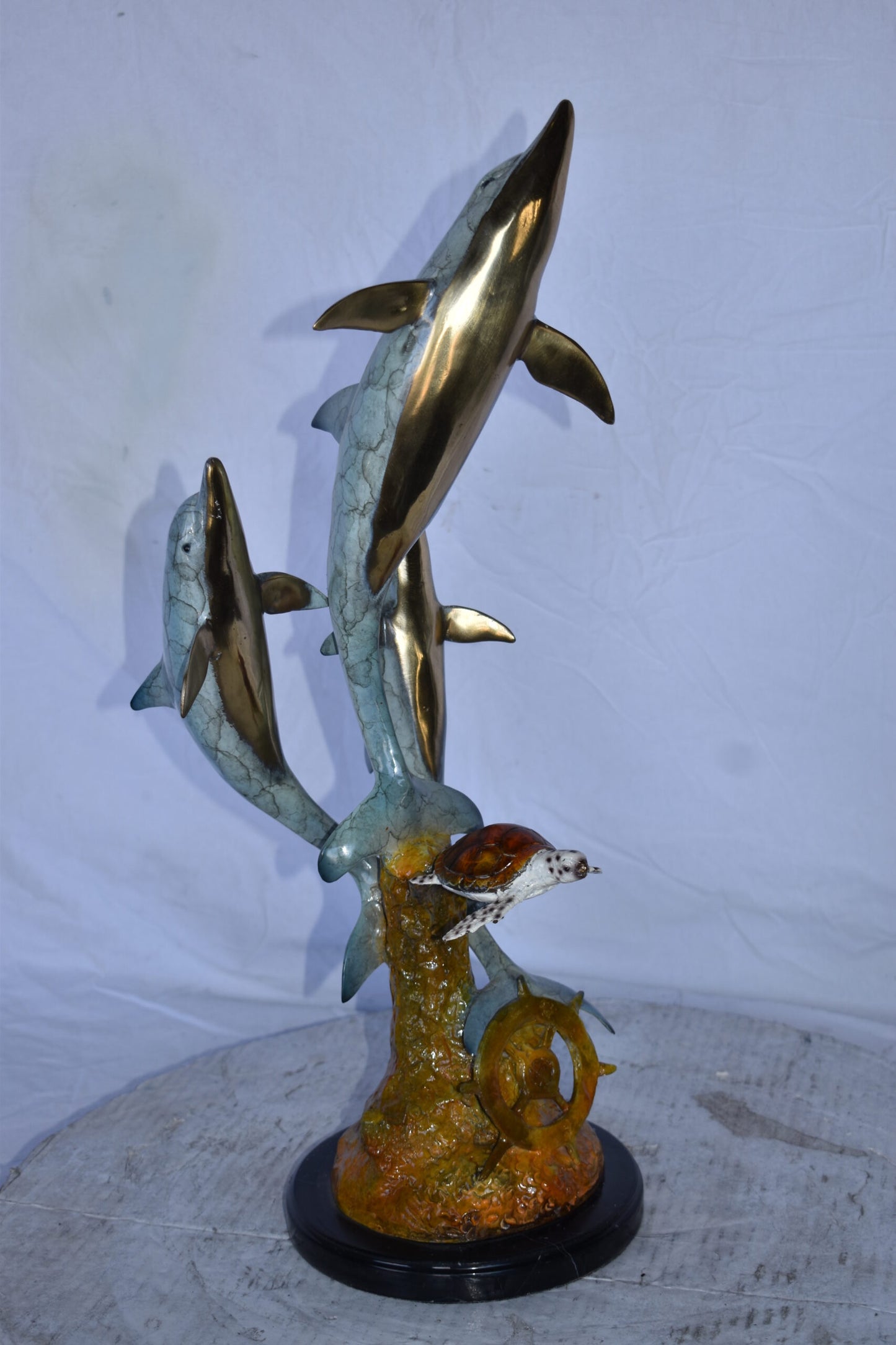 Three Dolphins Jumping Next to A Sea Turtle Bronze Statue 10"x 11" x 24"H.