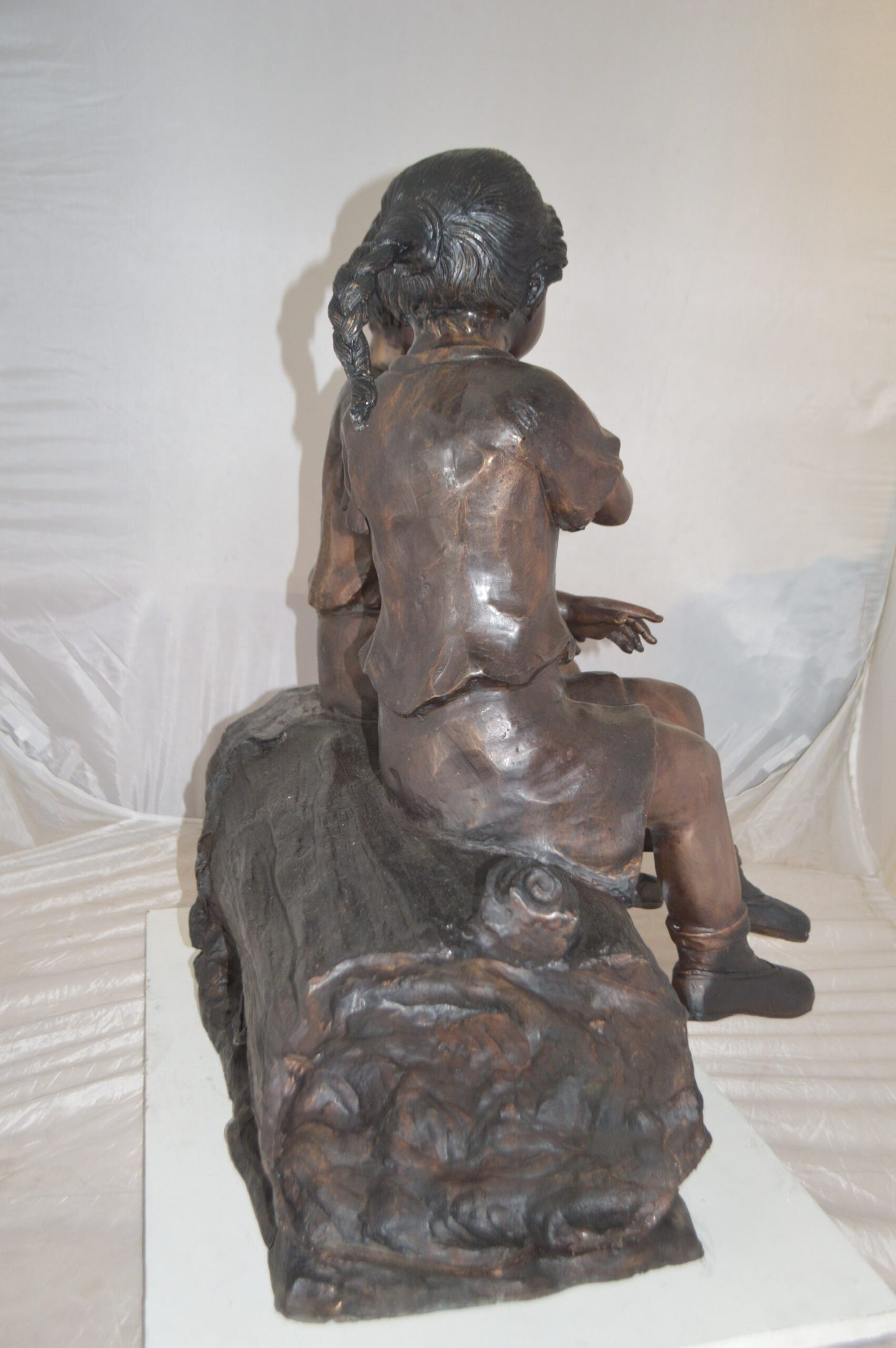 Boy and Girl enjoying an ice-cream bronze statue -  Size: 28"L x 24"W x 33"H.
