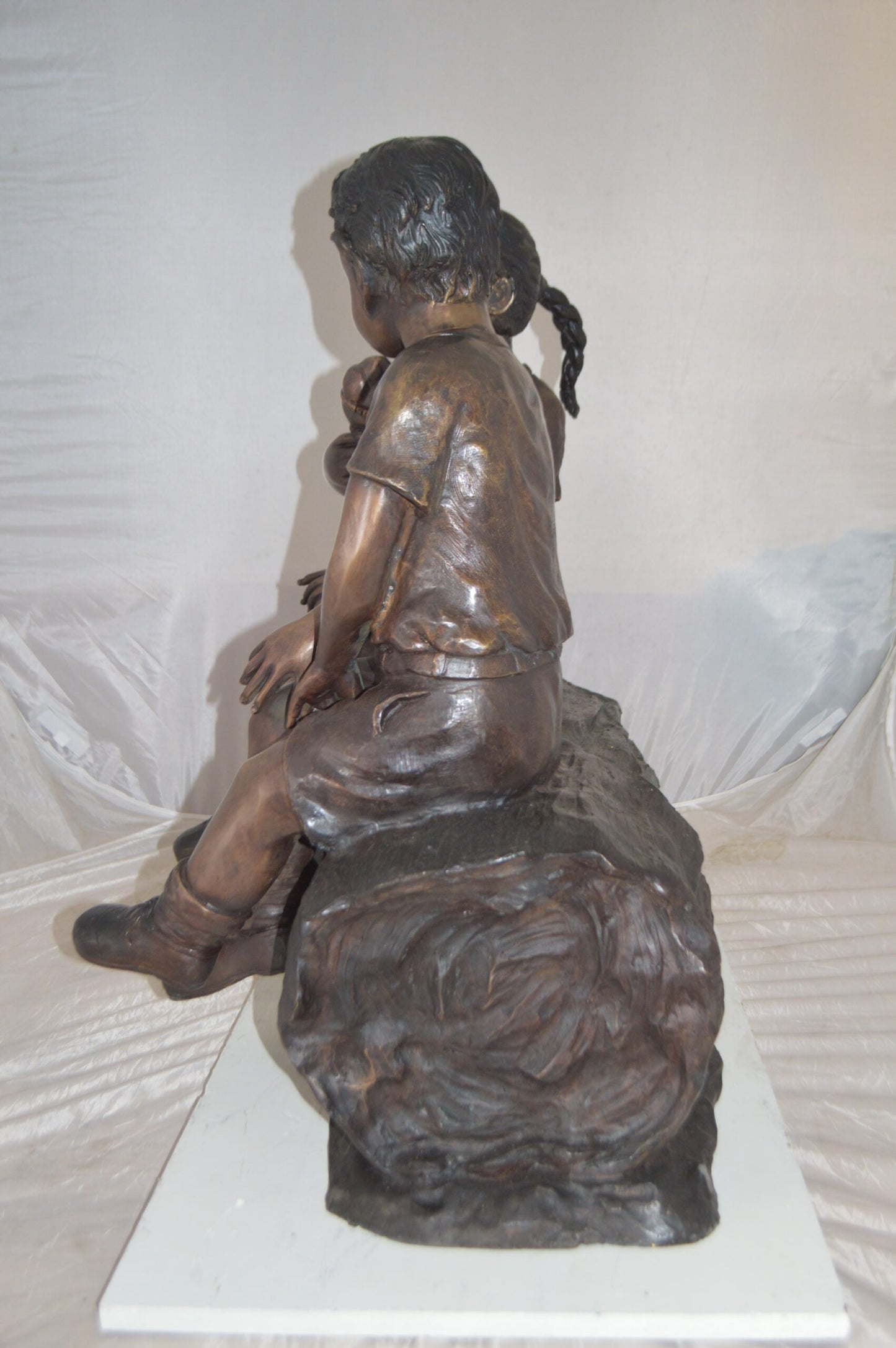 Boy and Girl enjoying an ice-cream bronze statue -  Size: 28"L x 24"W x 33"H.