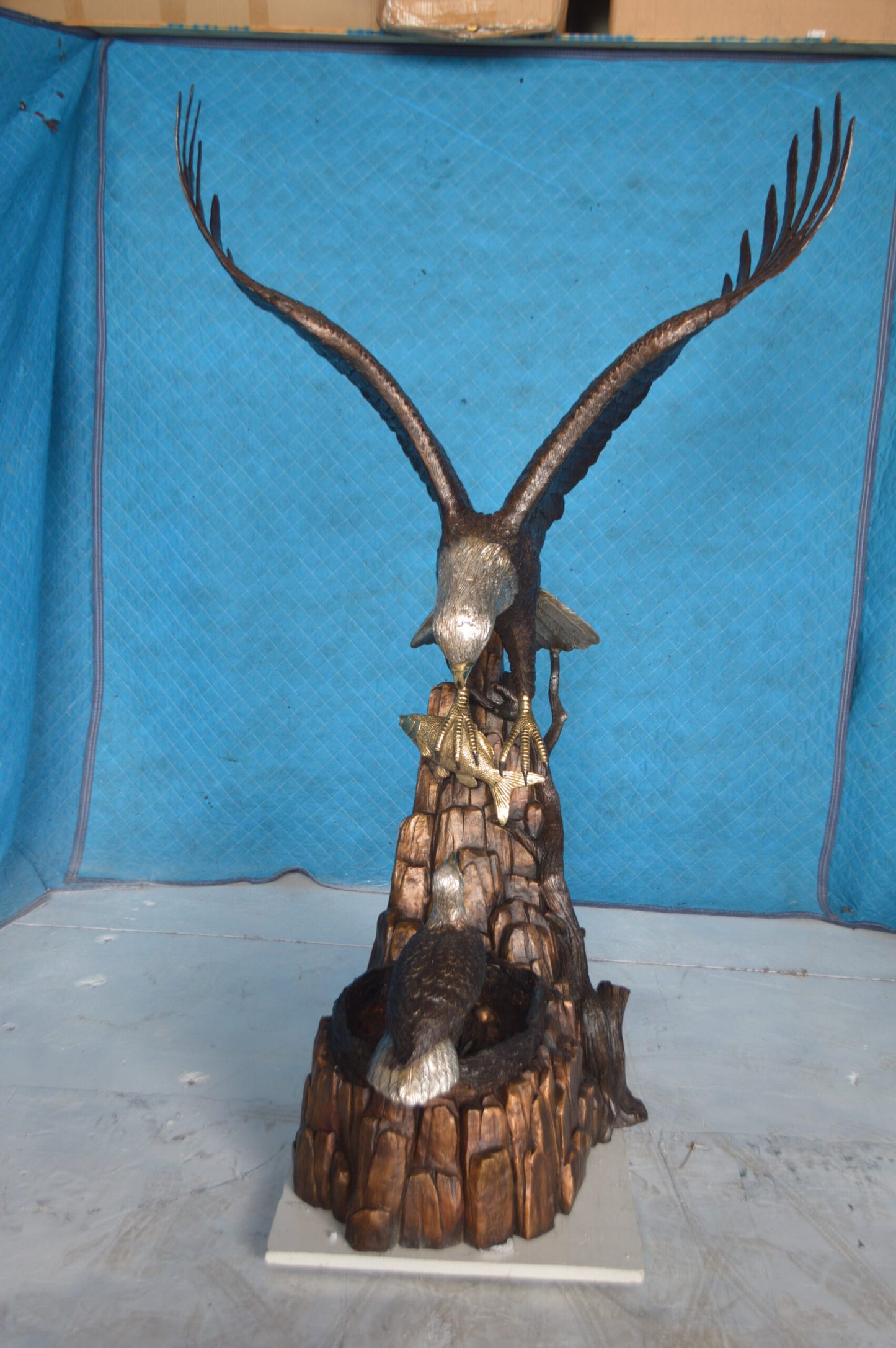 Eagle with nest Bronze Statue - Size: 36"L x 40"W x 63"H.