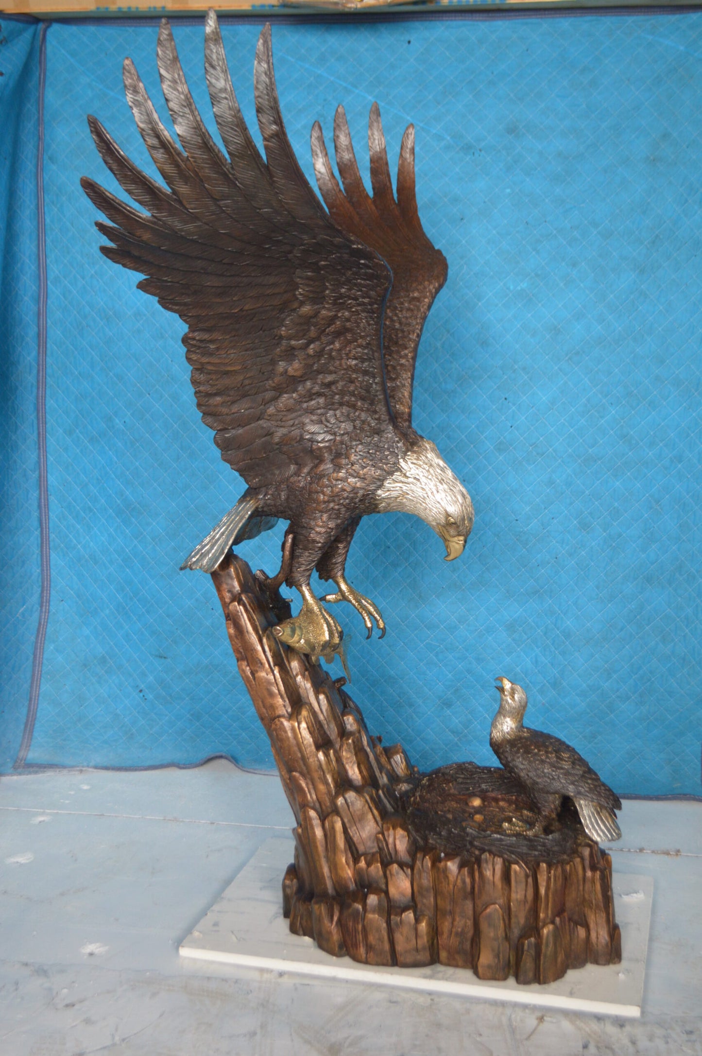 Eagle with nest Bronze Statue - Size: 36"L x 40"W x 63"H.