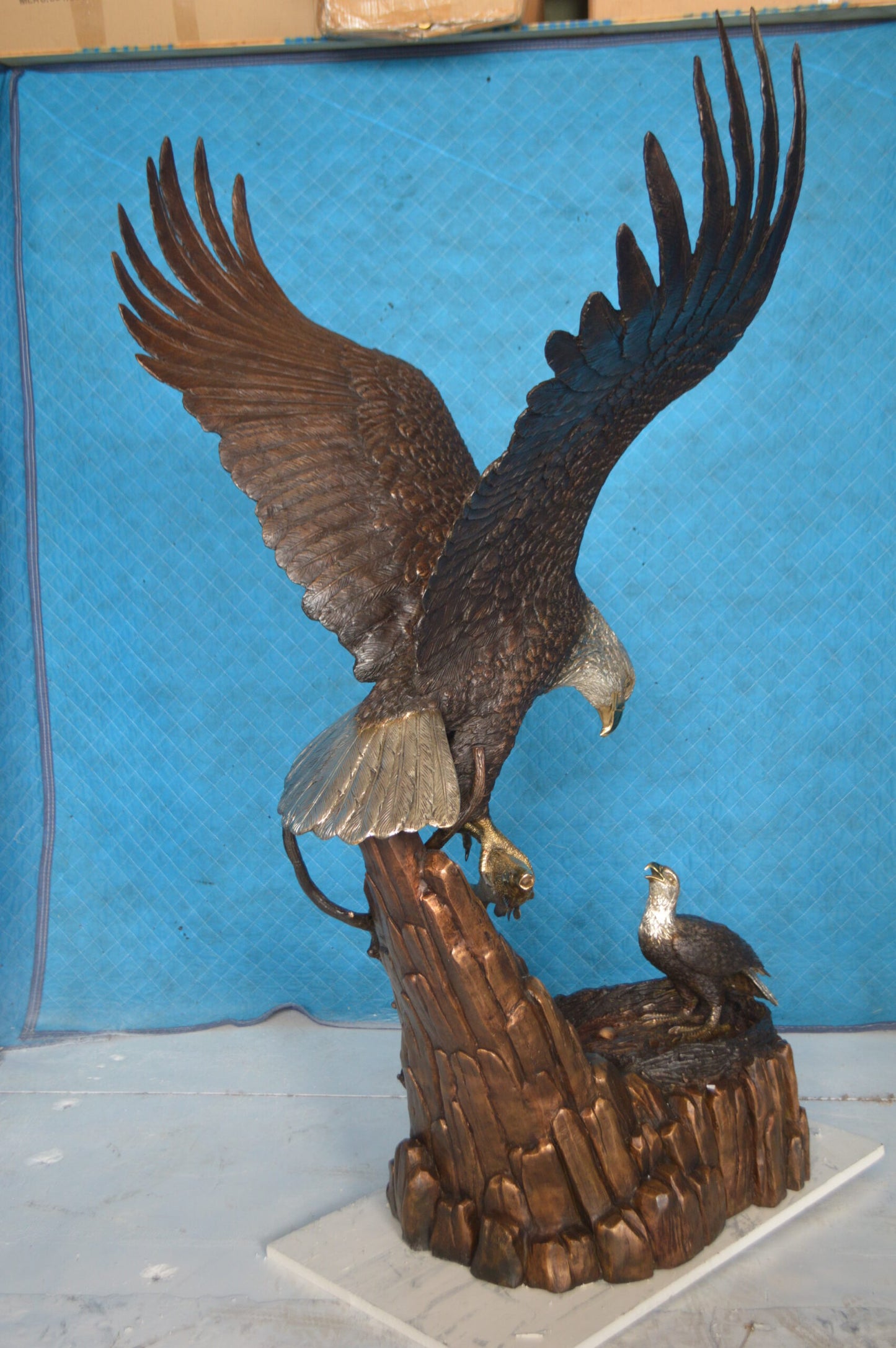 Eagle with nest Bronze Statue - Size: 36"L x 40"W x 63"H.