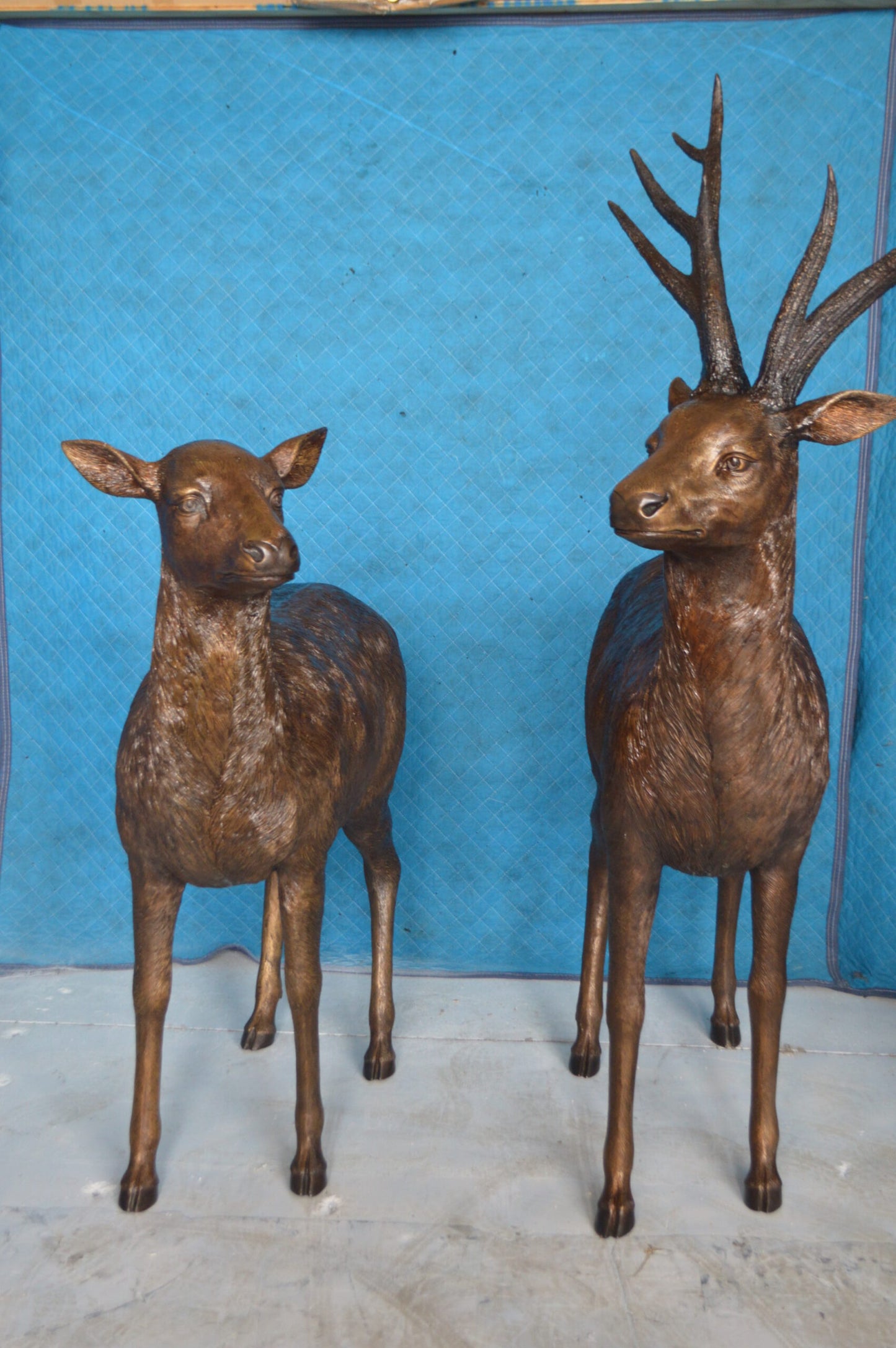 Pair of standing Deers bronze statues -  Size: 48"L x 45"W x 65"H.