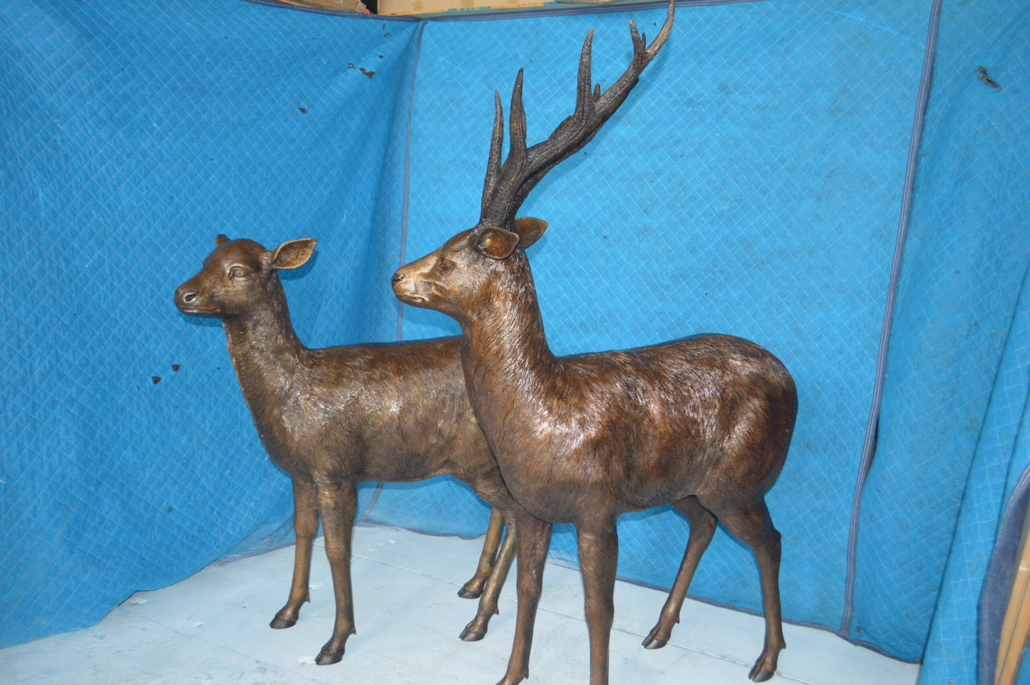 Pair of standing Deers bronze statues - Size: 48"L x 45"W x 65"H.