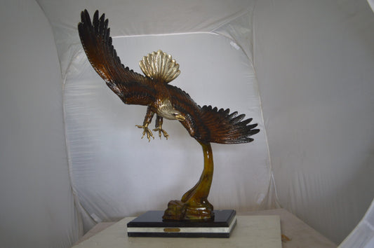 Eagle Soaring Bronze Statue by W Aribu -  Size: 35"L x 27"W x 38"H.