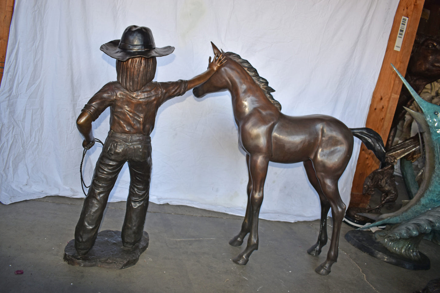 A Young Cowgirl with A Young Horse Bronze Statue Size: 60" x 30" x 44"H