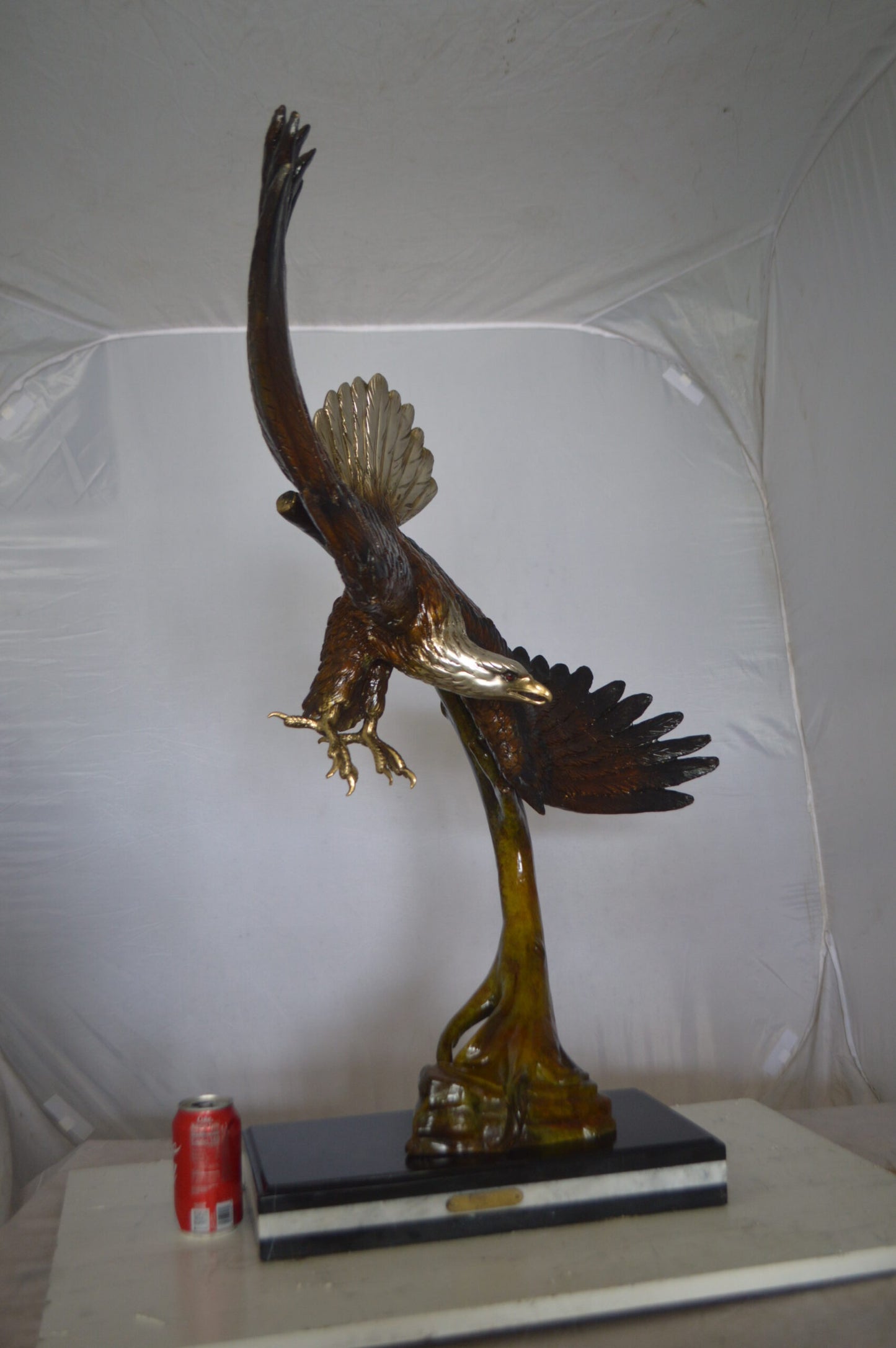 Eagle Soaring Bronze Statue by W Aribu - Size: 35"L x 27"W x 38"H.