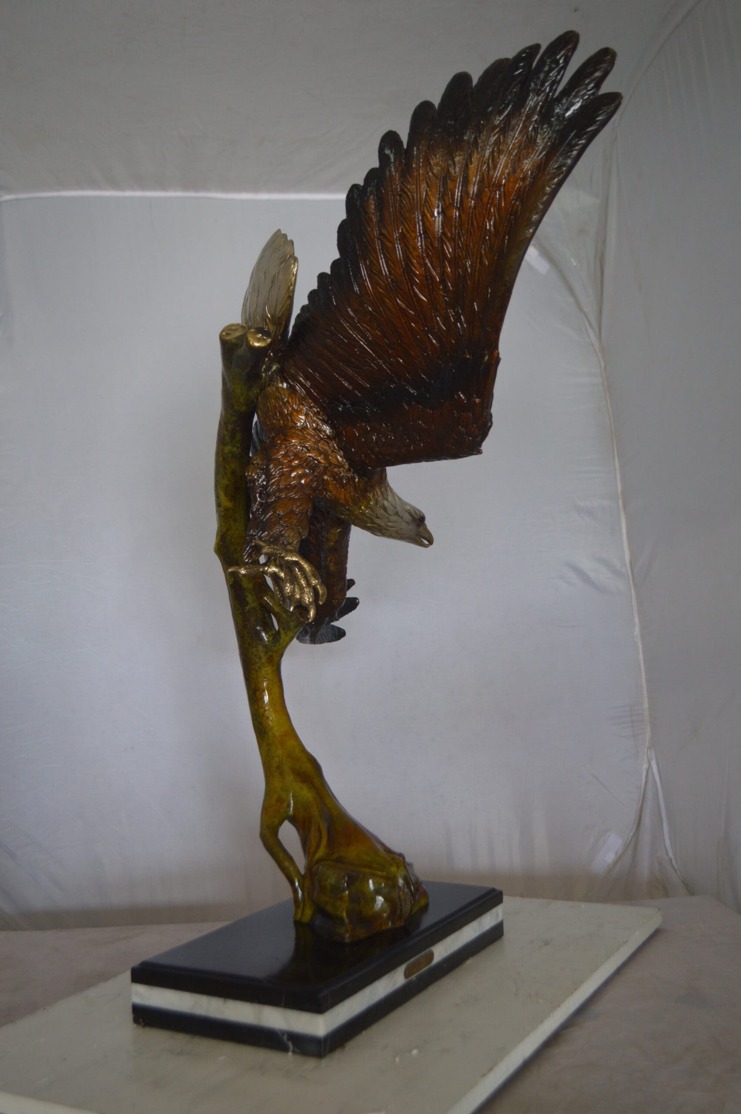 Eagle Soaring Bronze Statue by W Aribu - Size: 35"L x 27"W x 38"H.