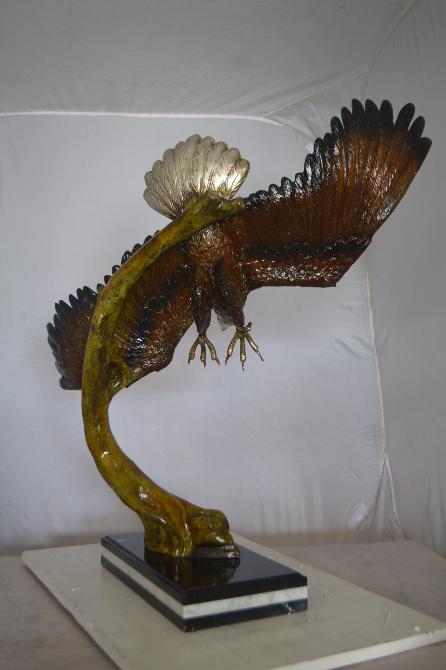 Eagle Soaring Bronze Statue by W Aribu - Size: 35"L x 27"W x 38"H.