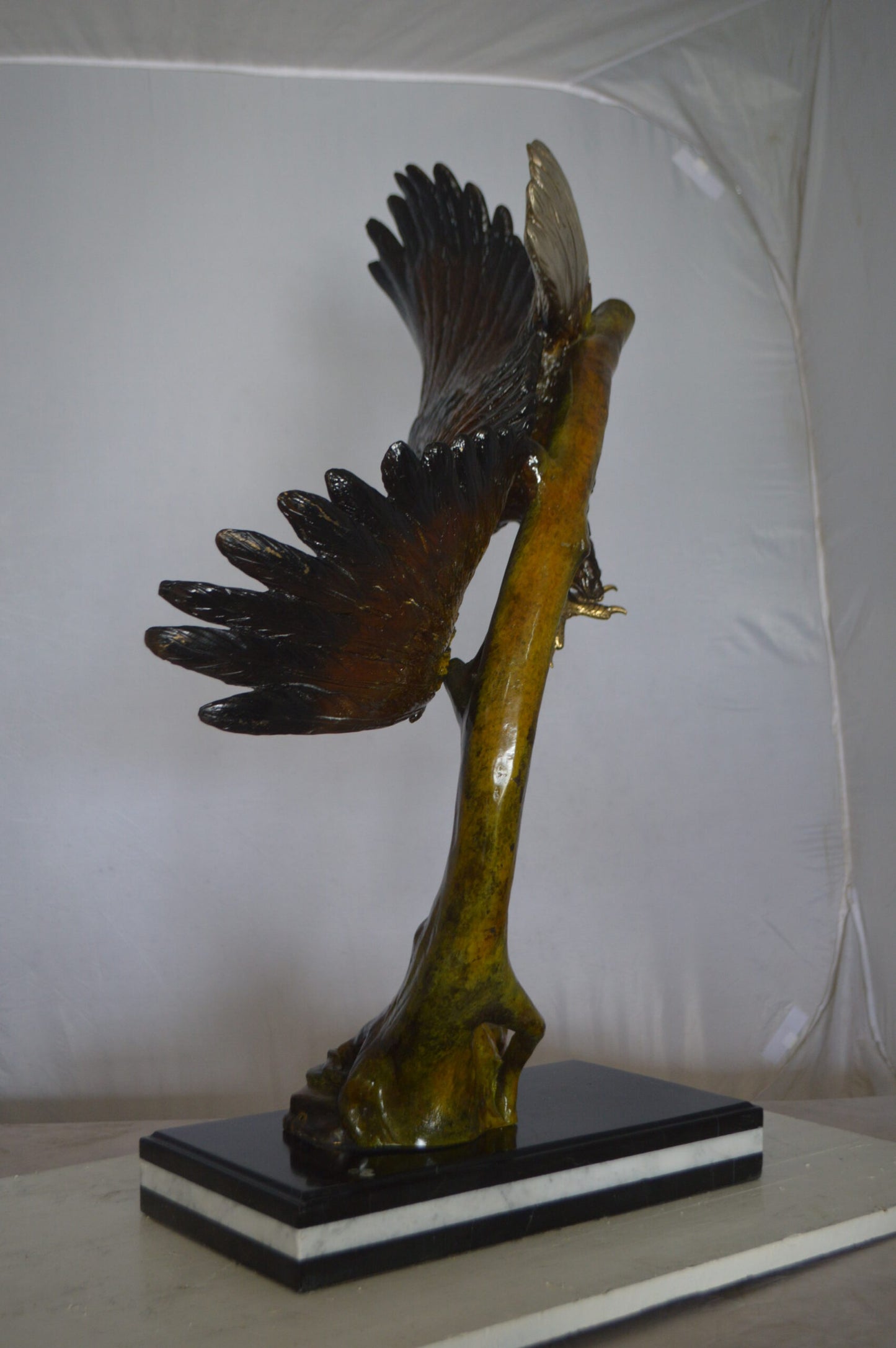 Eagle Soaring Bronze Statue by W Aribu - Size: 35"L x 27"W x 38"H.