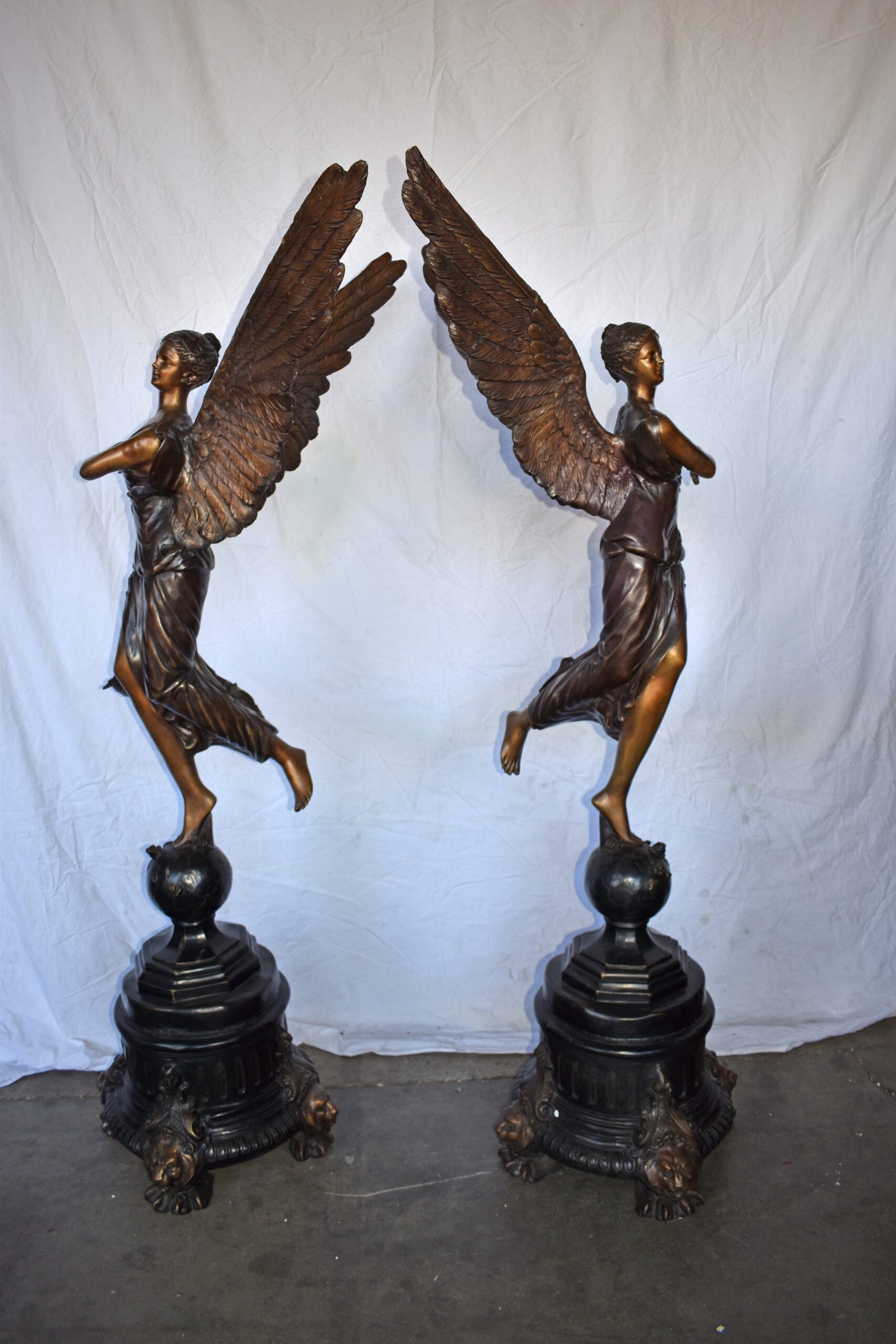 A Pair of Angels of Fortune Bronze Statues Size: 27" x 27" x 69"H