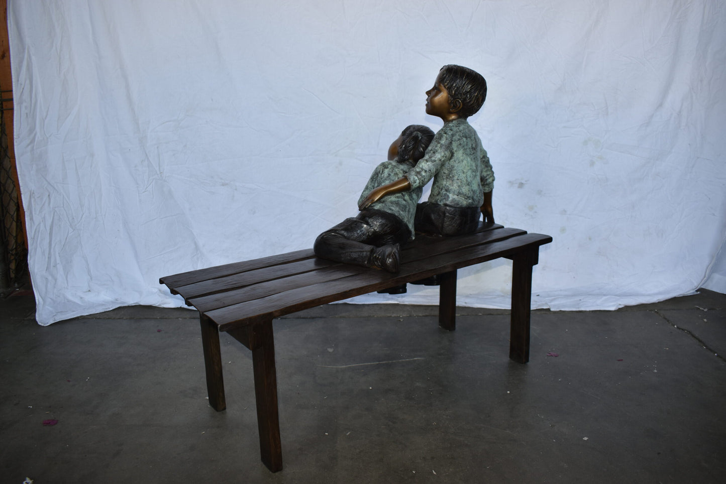 Brother and Sister on A Bench Enjoying Outdoors Bronze Statue  18" x 39" x 33"H