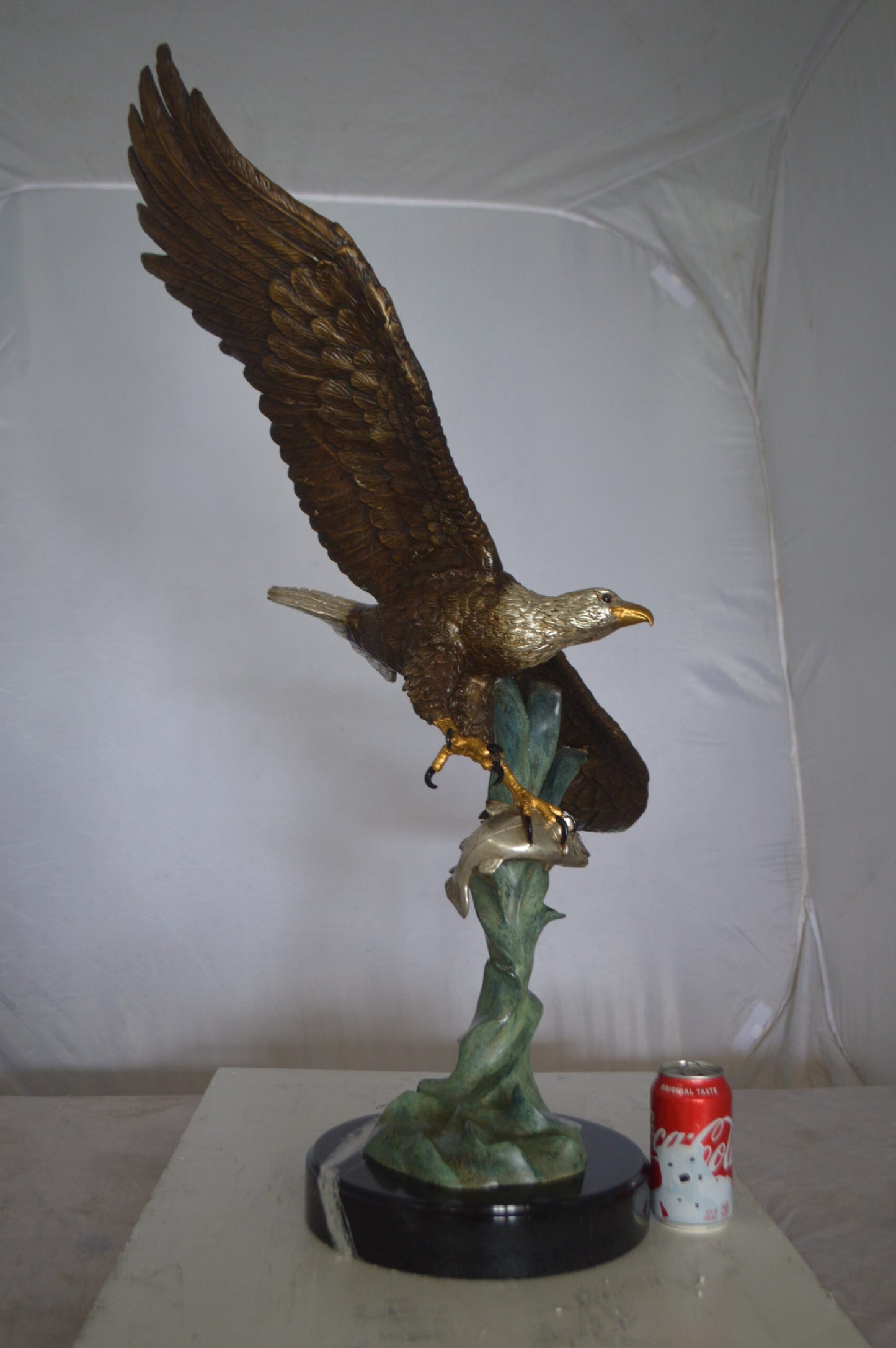 Eagle Flying With His Pray Bronze Statue -  Size: 32"L x 15"W x 33"H.