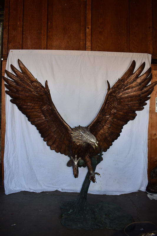 Giant Eagle Catching His Prey in Action Bronze Statue Size: 84" x 40" x 84"H