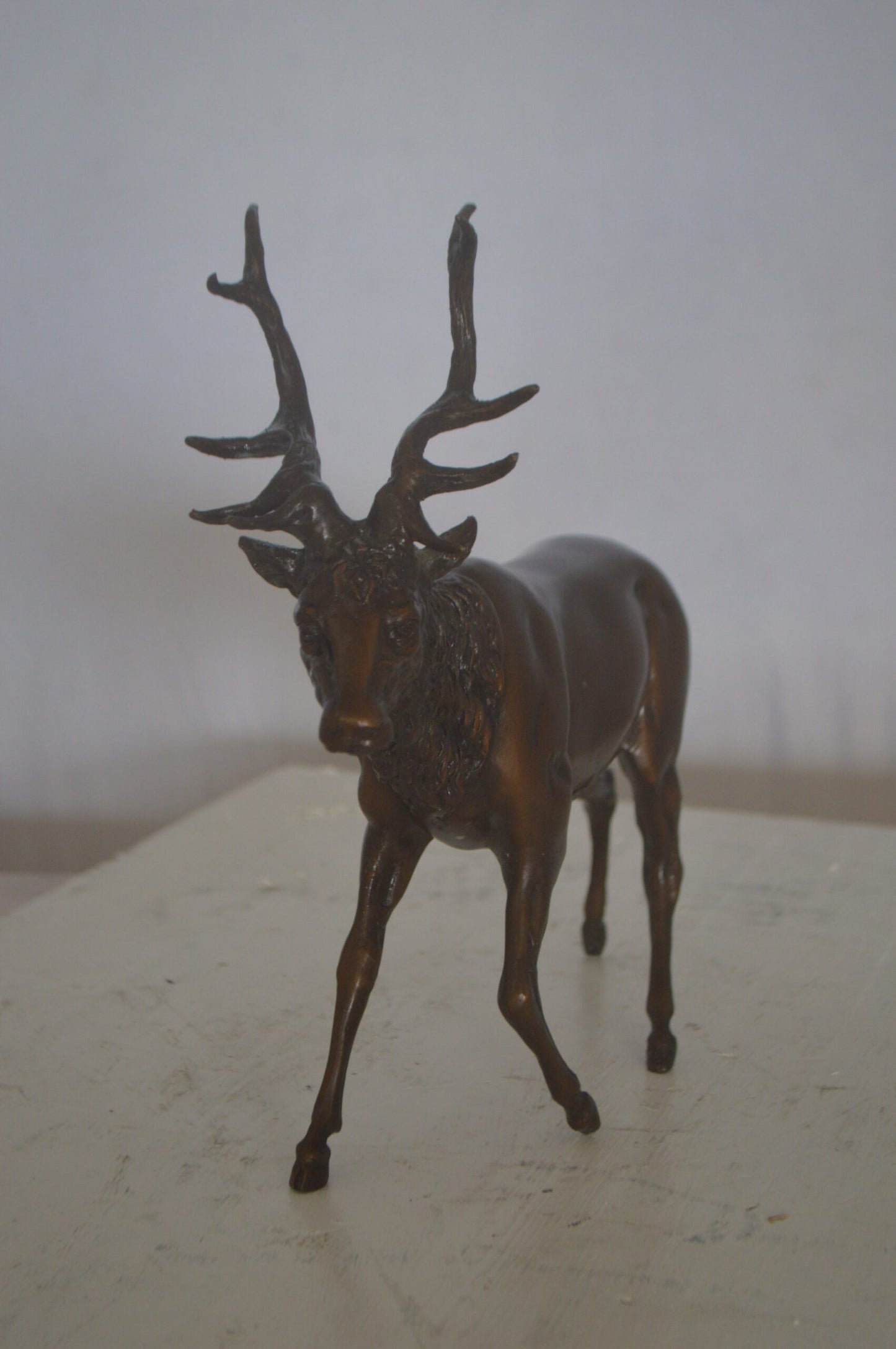 Running Deer Bronze Statue - Size: 15"L x 4"W x 13"H.