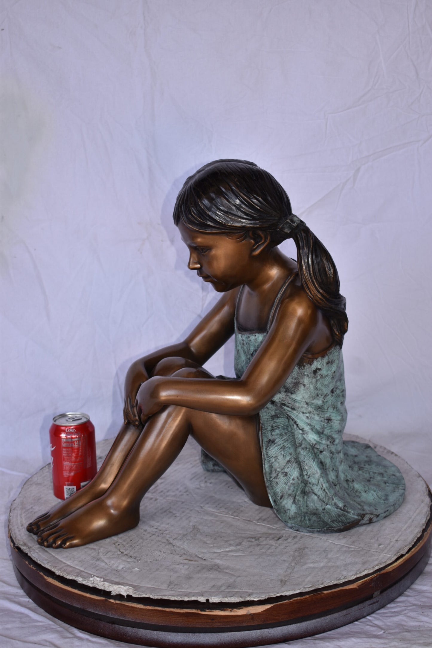 Girl Sitting on The Ground Enjoying the Sun Bronze Statues 22" x 15" x 19"H