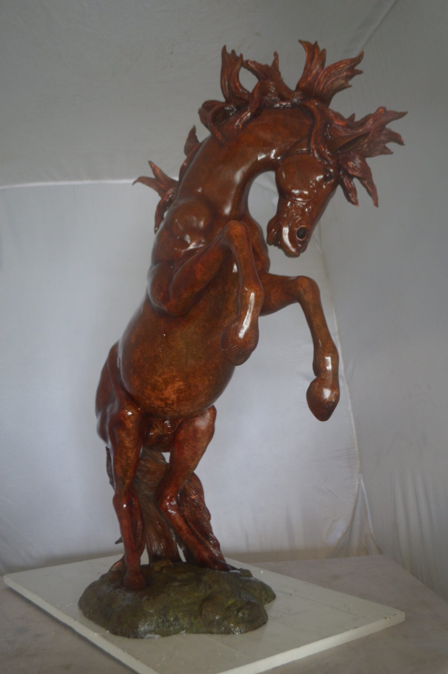 Large Rearing Horse Red Finished Bronze Statue - Size: 34"L x 21"W x 46"H.