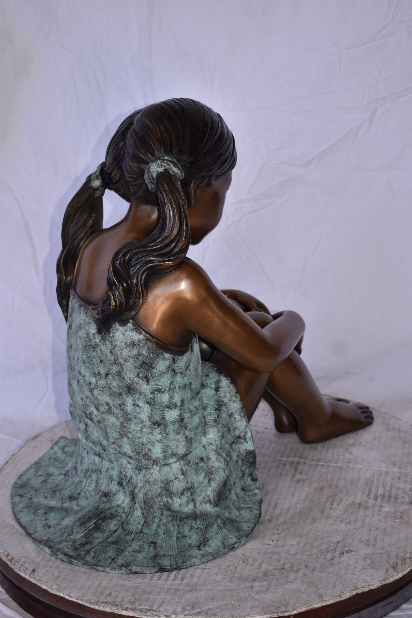 Girl Sitting on The Ground Enjoying the Sun Bronze Statues 22" x 15" x 19"H
