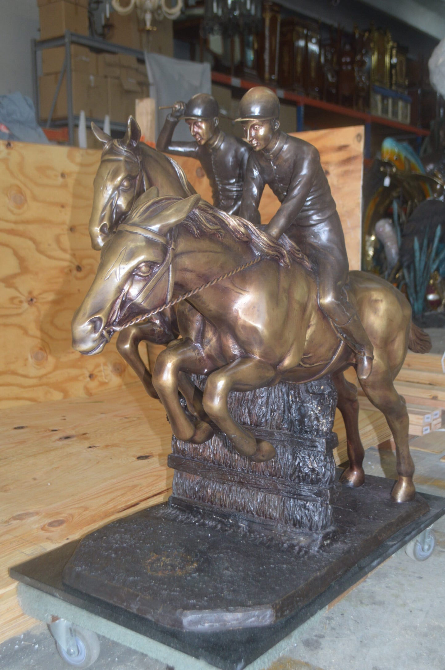 Two Horse Riders Racing Each Other Bronze Statue - Size: 45"L x 21"W x 42"H.