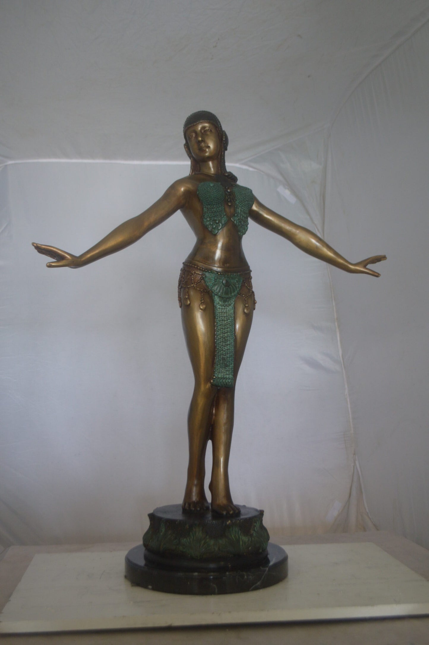 Belly Dancer Performing Bronze Statue - Size: 32"L x 8"W x 41"H.