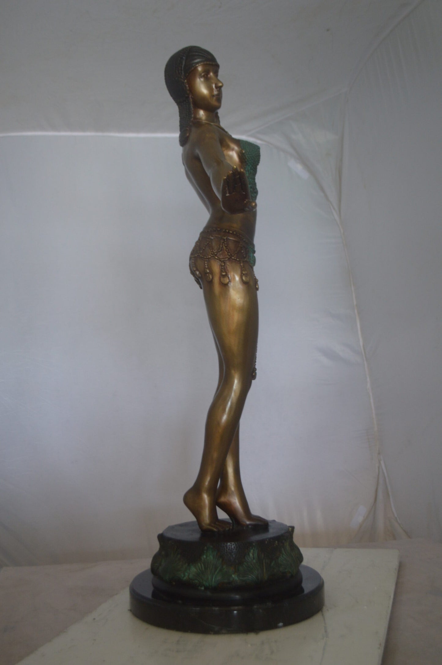 Belly Dancer Performing Bronze Statue - Size: 32"L x 8"W x 41"H.