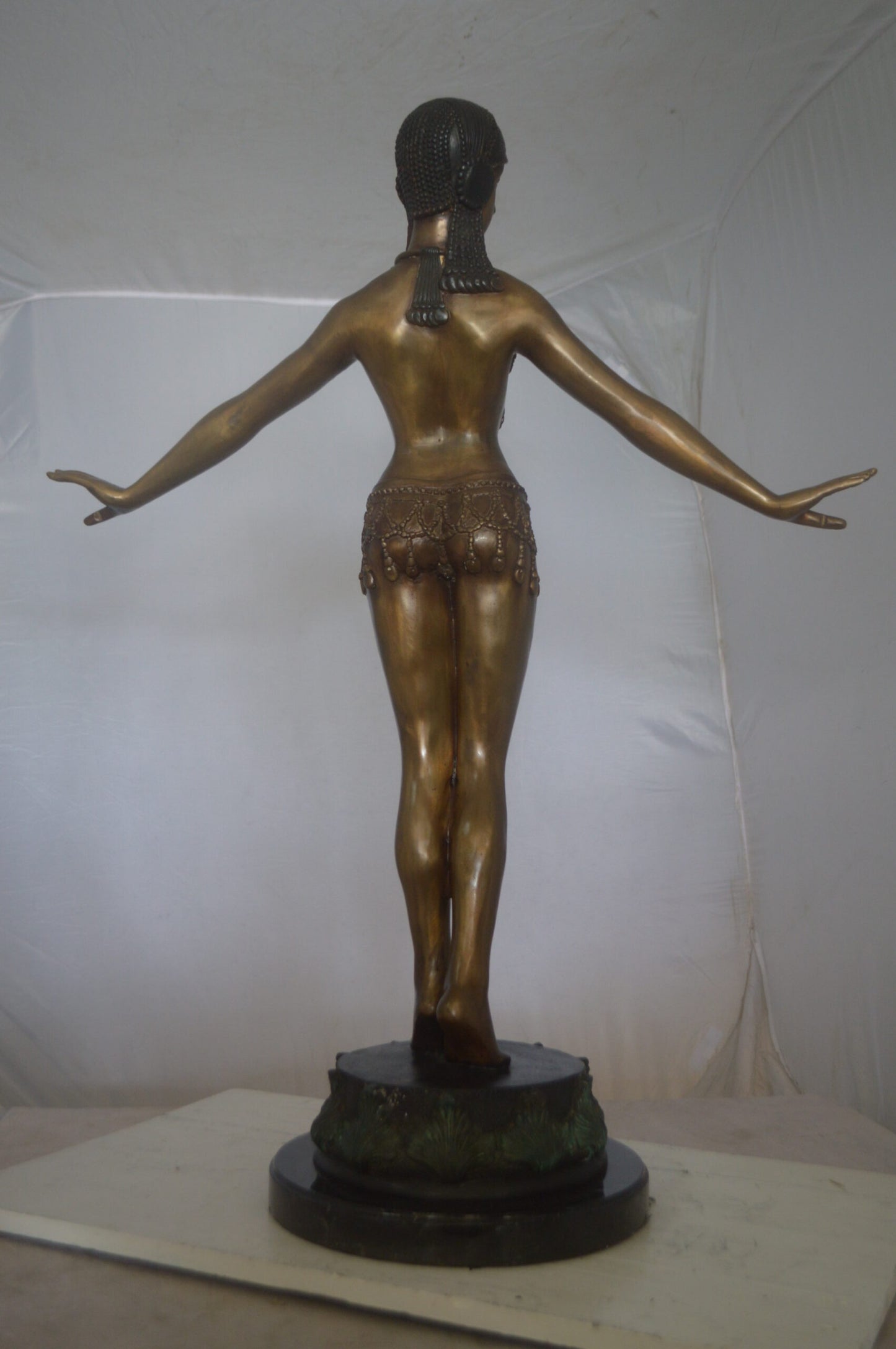 Belly Dancer Performing Bronze Statue -  Size: 32"L x 8"W x 41"H.