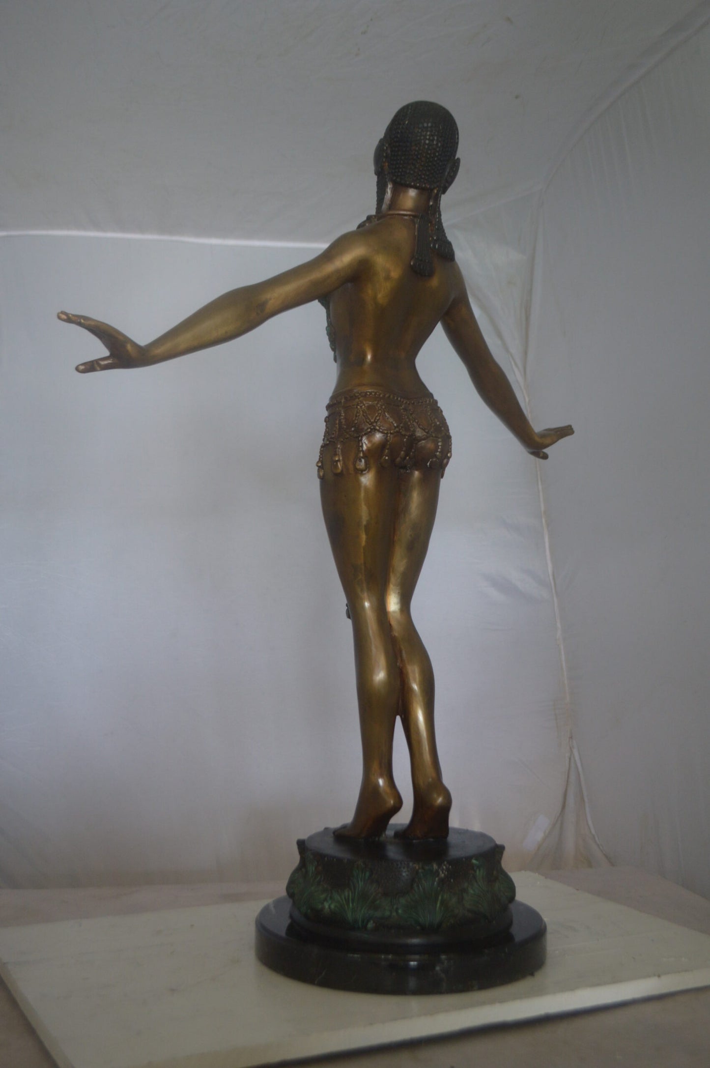 Belly Dancer Performing Bronze Statue -  Size: 32"L x 8"W x 41"H.