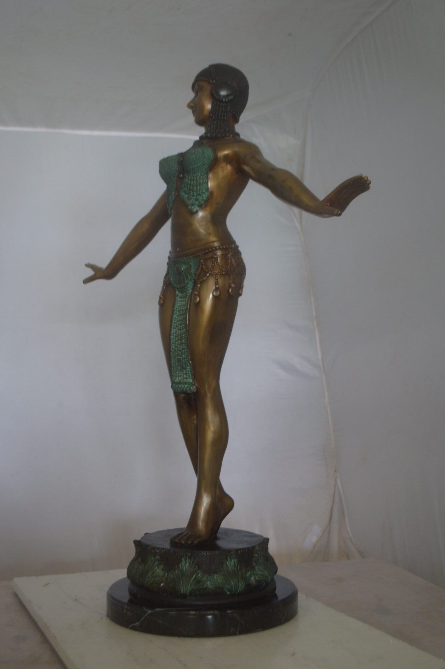 Belly Dancer Performing Bronze Statue -  Size: 32"L x 8"W x 41"H.