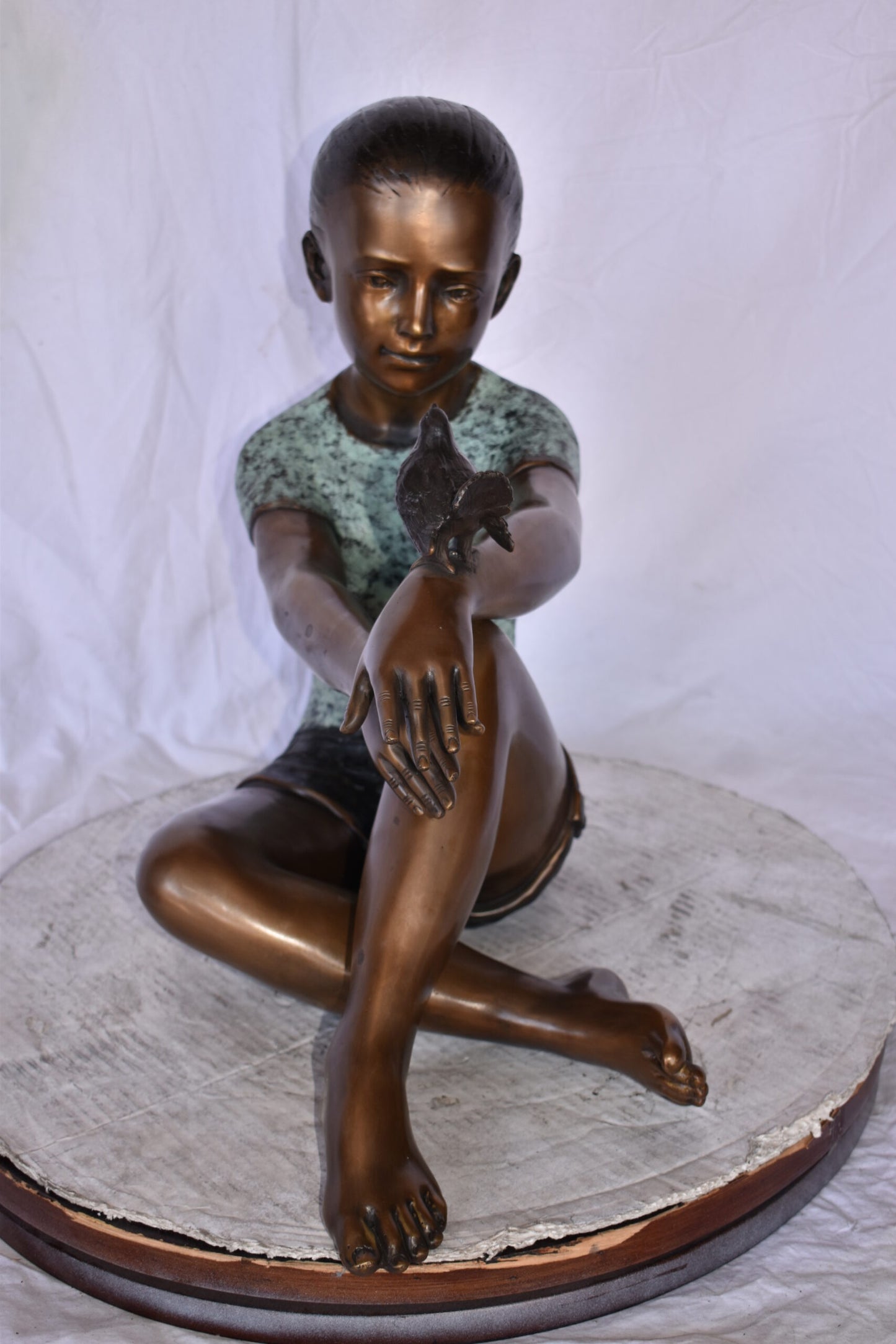 Girl Sitting with A Bird on Her Hand Bronze Statue Size: 23" x 13" x 21"H