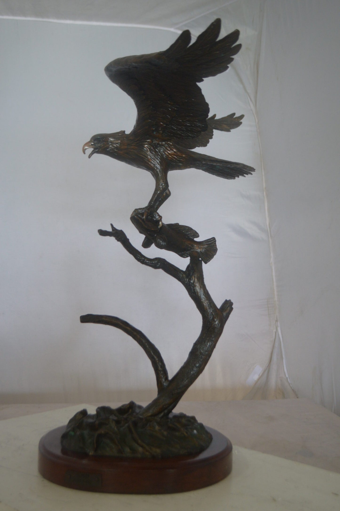 Osprey Eagle Bronze Statue by Carl Wagner  -  Size: 28"L x 14"W x 28"H.