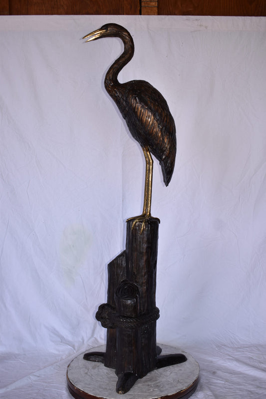 Crane Looking Out Standing on A Tree Stump Bronze Statue Size: 19" x 17" x 62"H